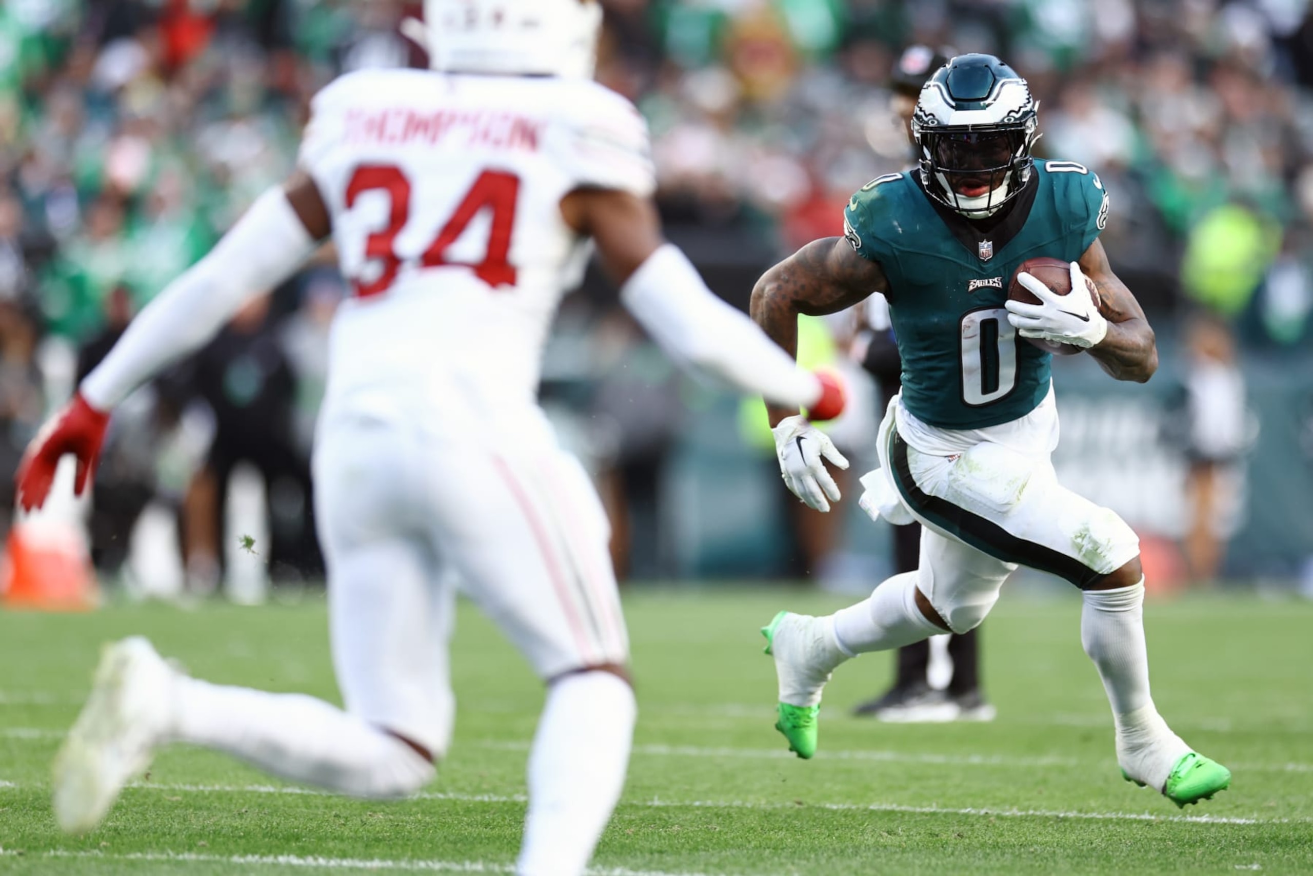 PHILADELPHIA, PENNSYLVANIA - DECEMBER 31: D'Andre Swift #0 of the Philadelphia Eagles runs with the ball during the fourth quarter against the Arizona Cardinals at Lincoln Financial Field on December 31, 2023 in Philadelphia, Pennsylvania. (Photo by Tim Nwachukwu/Getty Images) PHILADELPHIA, PENNSYLVANIA - DECEMBER 31: D'Andre Swift #0 of the Philadelphia Eagles runs with the ball during the fourth quarter against the Arizona Cardinals at Lincoln Financial Field on December 31, 2023 in Philadelphia, Pennsylvania. (Photo by Tim Nwachukwu/Getty Images)