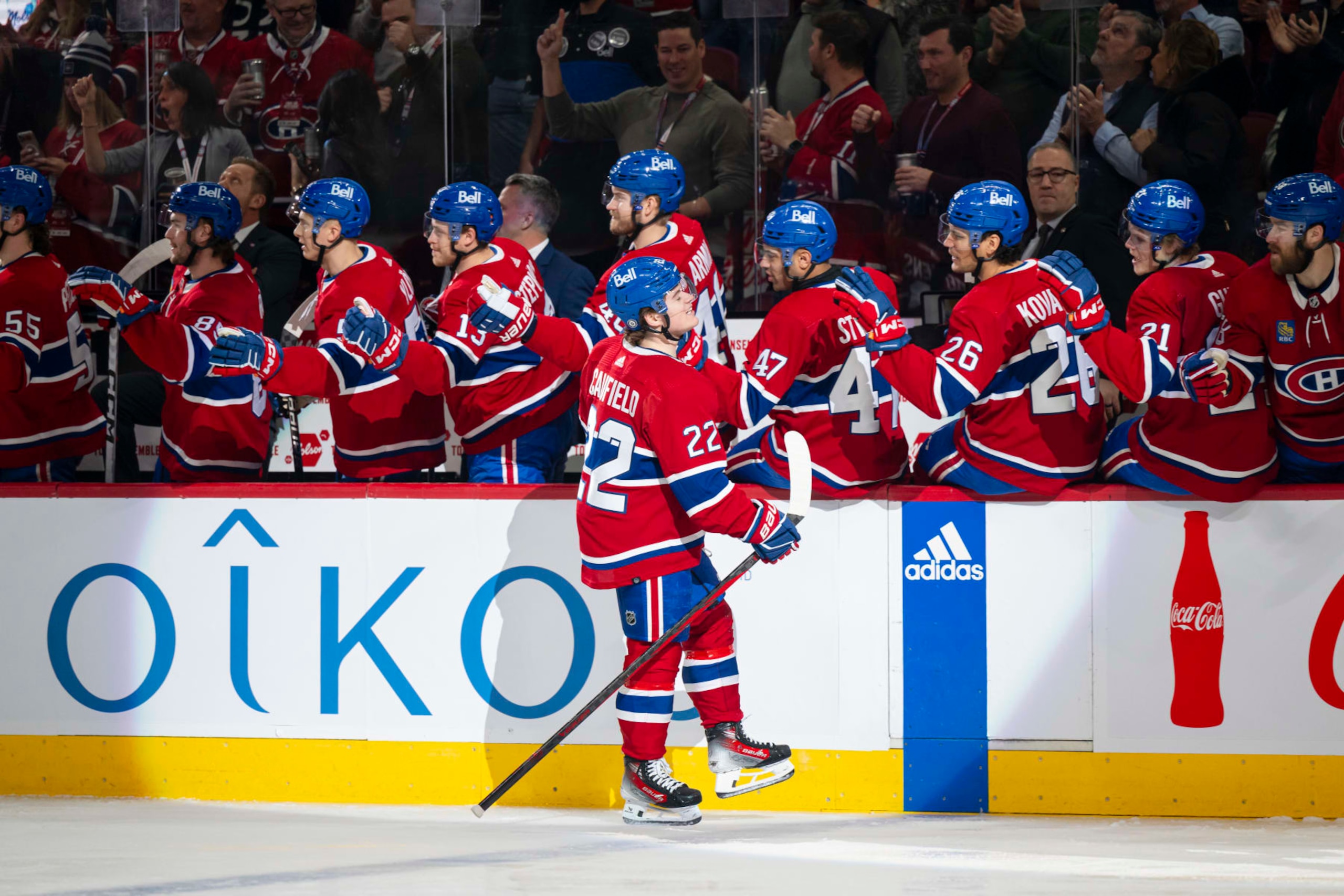MONTREAL, CANADA - JANUARY 13: Cole Caufield #22 of the Montreal Canadiens celebrates a goal with the bench during the first period of the NHL regular season game between the Montreal Canadiens and the Edmonton Oilers at the Bell Centre on January 13, 2024 in Montreal, Quebec, Canada. (Photo by Matt Garies/NHLI via Getty Images)
