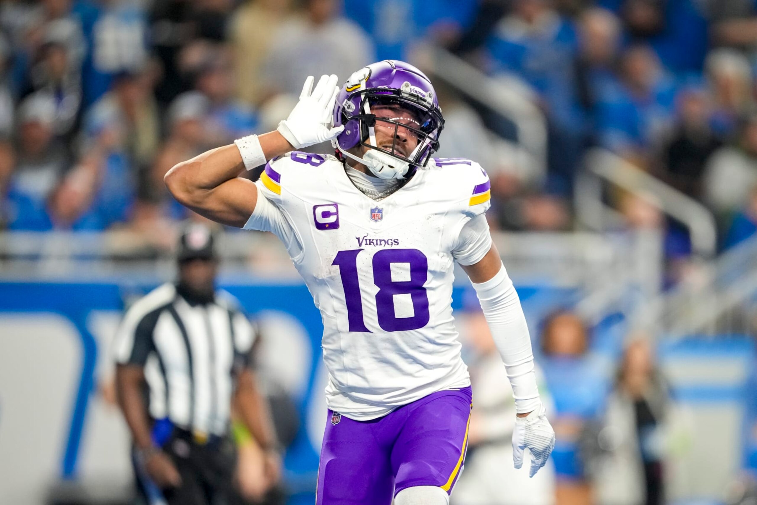 DETROIT, MICHIGAN - JANUARY 07: Justin Jefferson #18 of the Minnesota Vikings celebrates after a touchdown during the third quarter in the game against the Detroit Lions at Ford Field on January 07, 2024 in Detroit, Michigan. (Photo by Nic Antaya/Getty Images)
