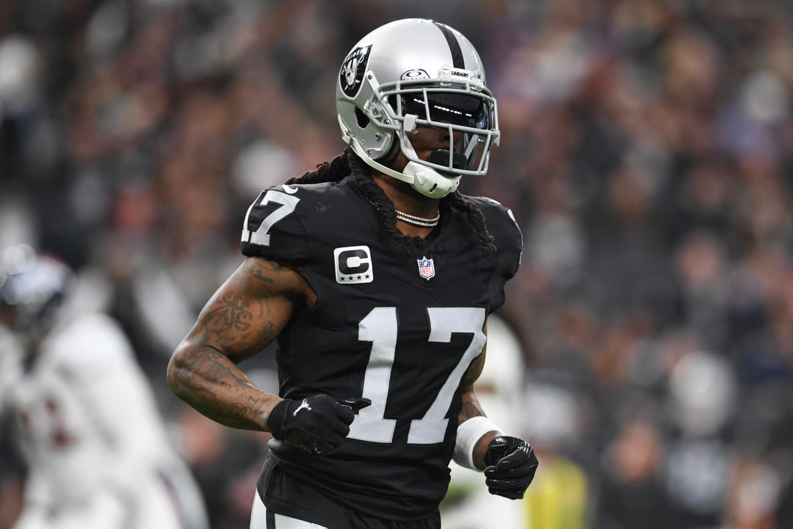 LAS VEGAS, NEVADA - JANUARY 07: Wide receiver Davante Adams #17 of the Las Vegas Raiders runs across the field against the Denver Broncos in the second quarter at Allegiant Stadium on January 07, 2024 in Las Vegas, Nevada. The Raiders defeated the Broncos 27-14. (Photo by Candice Ward/Getty Images)