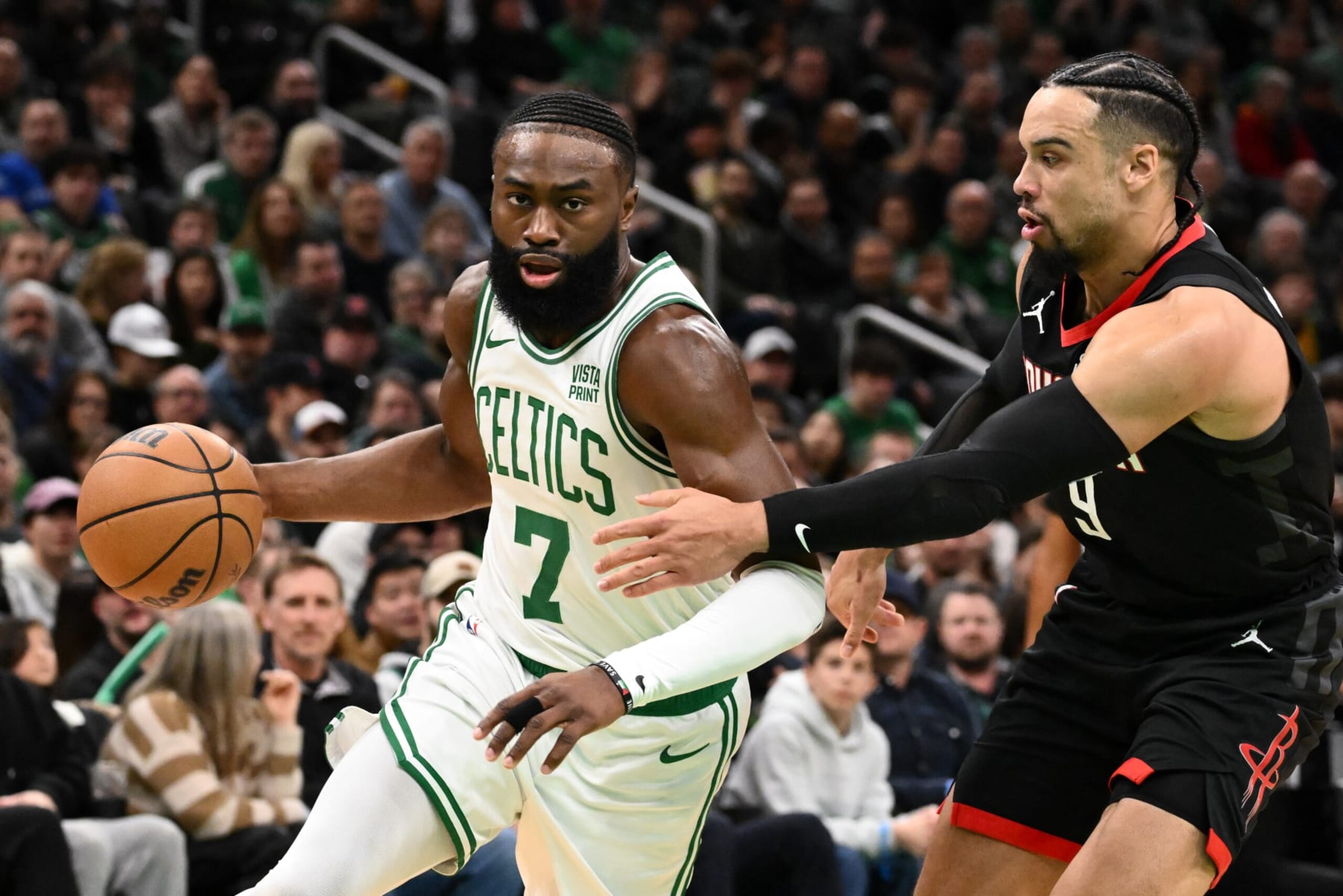 BOSTON, MASSACHUSETTS - JANUARY 13: Jaylen Brown #7 of the Boston Celtics drives to the basket against Dillon Brooks #9 of the Houston Rockets during the first quarter at the TD Garden on January 13, 2024 in Boston, Massachusetts. NOTE TO USER: User expressly acknowledges and agrees that, by downloading and or using this photograph, User is consenting to the terms and conditions of the Getty Images License Agreement. (Photo by Brian Fluharty/Getty Images) BOSTON, MASSACHUSETTS - JANUARY 13: Jaylen Brown #7 of the Boston Celtics drives to the basket against Dillon Brooks #9 of the Houston Rockets during the first quarter at the TD Garden on January 13, 2024 in Boston, Massachusetts. NOTE TO USER: User expressly acknowledges and agrees that, by downloading and or using this photograph, User is consenting to the terms and conditions of the Getty Images License Agreement. (Photo by Brian Fluharty/Getty Images)