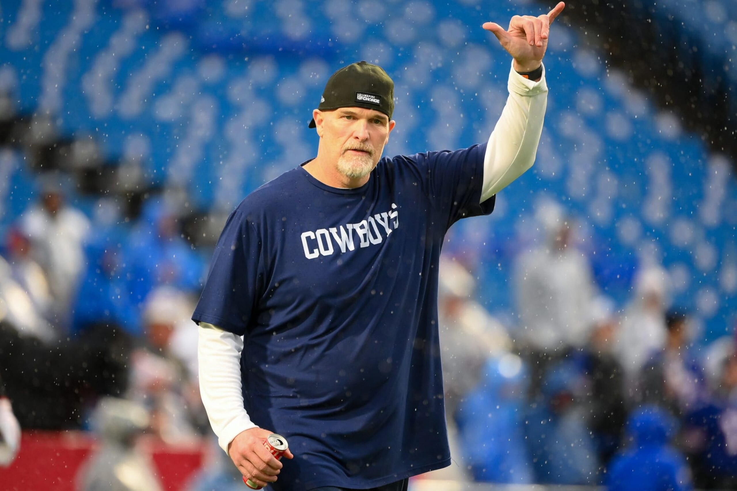 ORCHARD PARK, NEW YORK - DECEMBER 17: Defensive coordinator Dan Quinn of the Dallas Cowboys gestures to fans prior to the game prior to the game against the Buffalo Bills at Highmark Stadium on December 17, 2023 in Orchard Park, New York. The Bills won 31-10. (Photo by Rich Barnes/Getty Images)