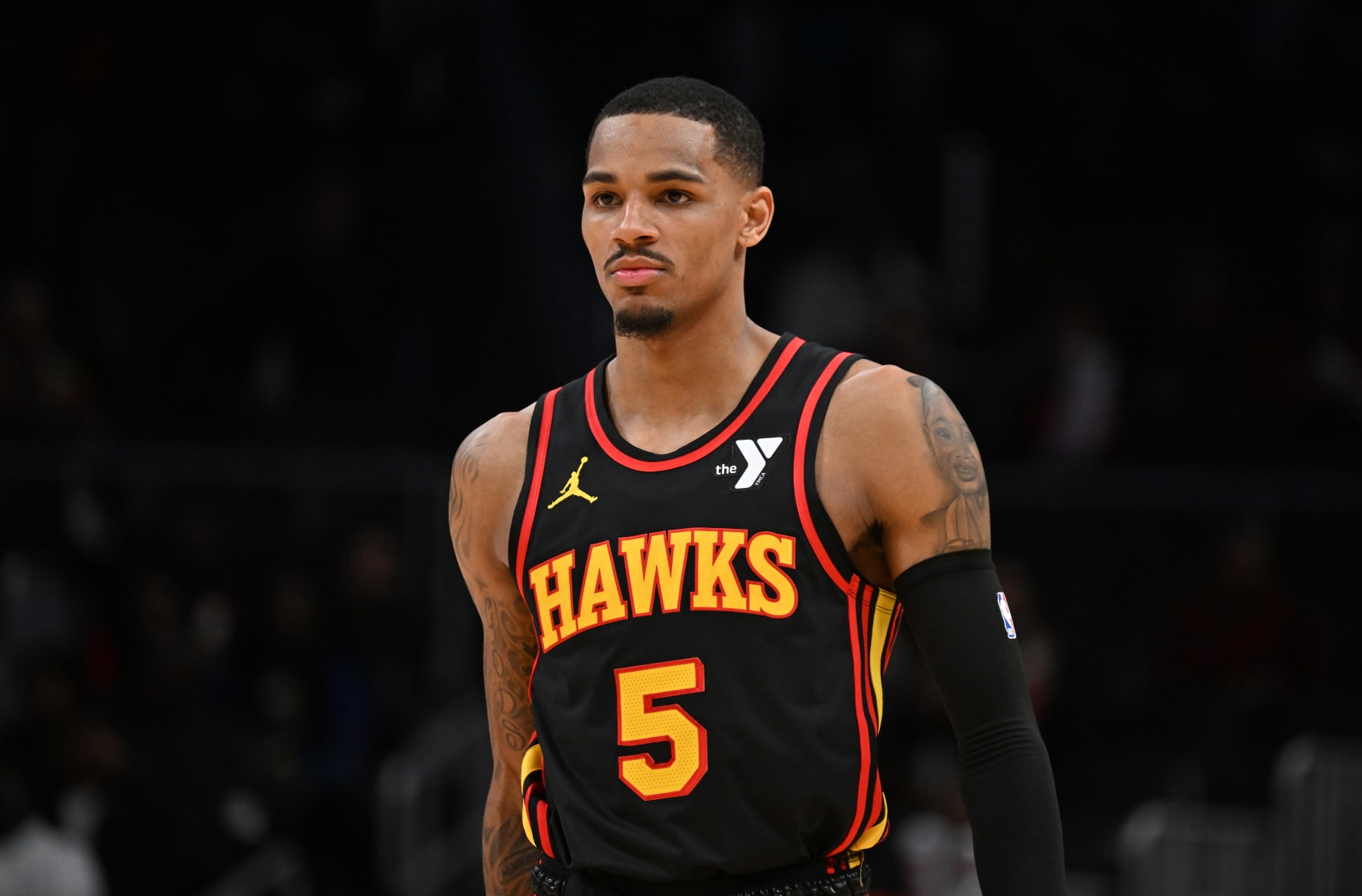 ATLANTA, GEORGIA - JANUARY 12: Dejounte Murray #5 of the Atlanta Hawks looks on during the game against the Indiana Pacers on January 12, 2024 at State Farm Arena in Atlanta, Georgia.  NOTE TO USER: User expressly acknowledges and agrees that, by downloading and or using this photograph, User is consenting to the terms and conditions of the Getty Images License Agreement. (Photo by Paras Griffin/Getty Images)