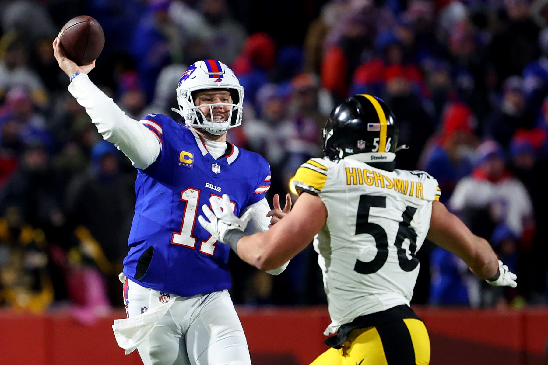 ORCHARD PARK, NEW YORK - JANUARY 15: Josh Allen #17 of the Buffalo Bills passes against Alex Highsmith #56 of the Pittsburgh Steelers during the third quarter at Highmark Stadium on January 15, 2024 in Orchard Park, New York. (Photo by Timothy T Ludwig/Getty Images)