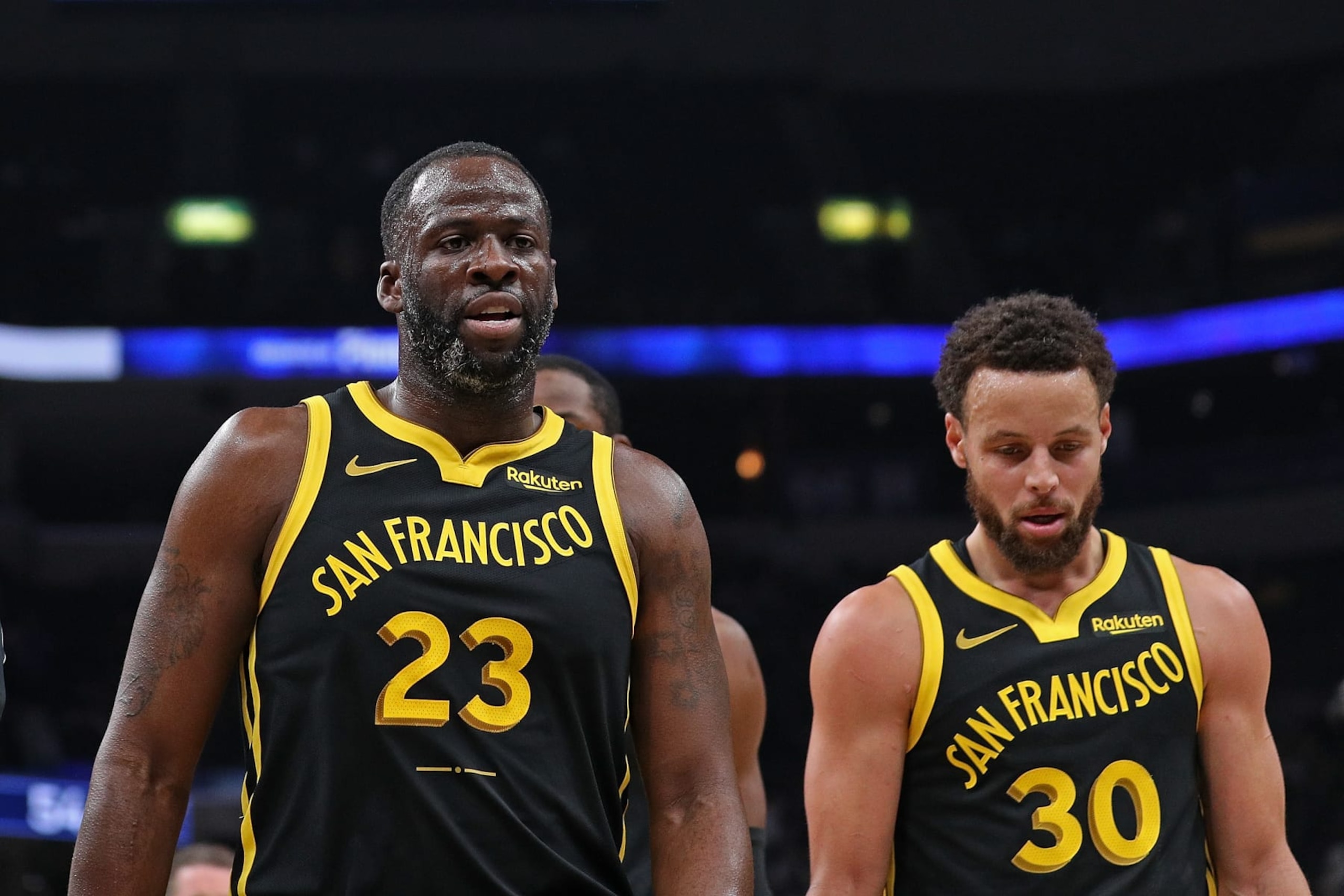 MEMPHIS, TENNESSEE - JANUARY 15: Draymond Green #23 of the Golden State Warriors and Stephen Curry #30 of the Golden State Warriors walk off the court during the first half against the Memphis Grizzlies at FedExForum on January 15, 2024 in Memphis, Tennessee. NOTE TO USER: User expressly acknowledges and agrees that, by downloading and or using this photograph, User is consenting to the terms and conditions of the Getty Images License Agreement. (Photo by Justin Ford/Getty Images)