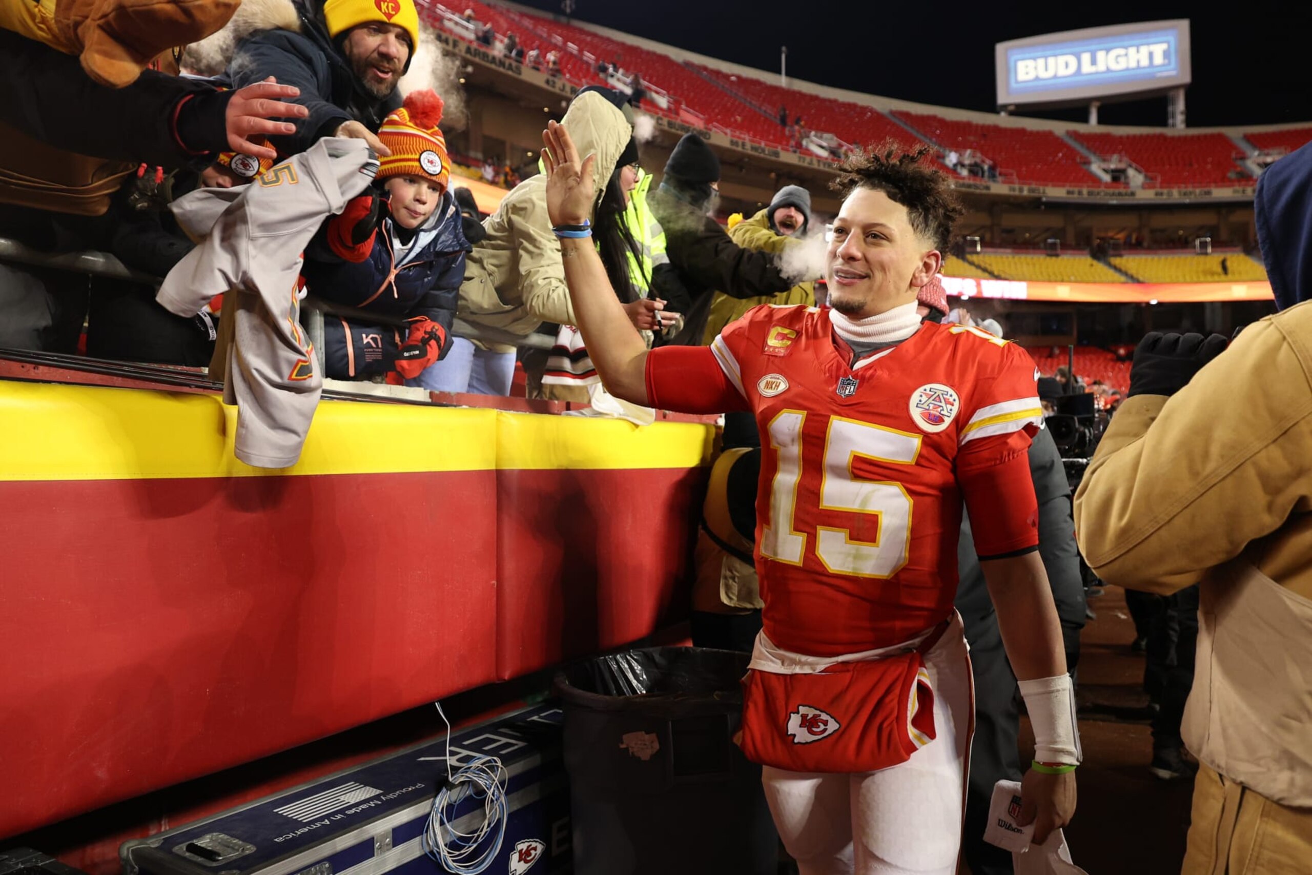 KANSAS CITY, MISSOURI - JANUARY 13: Patrick Mahomes #15 of the Kansas City Chiefs greets fans after defeating the Miami Dolphins 26-7 in the AFC Wild Card Playoffs at GEHA Field at Arrowhead Stadium on January 13, 2024 in Kansas City, Missouri. (Photo by Jamie Squire/Getty Images)
