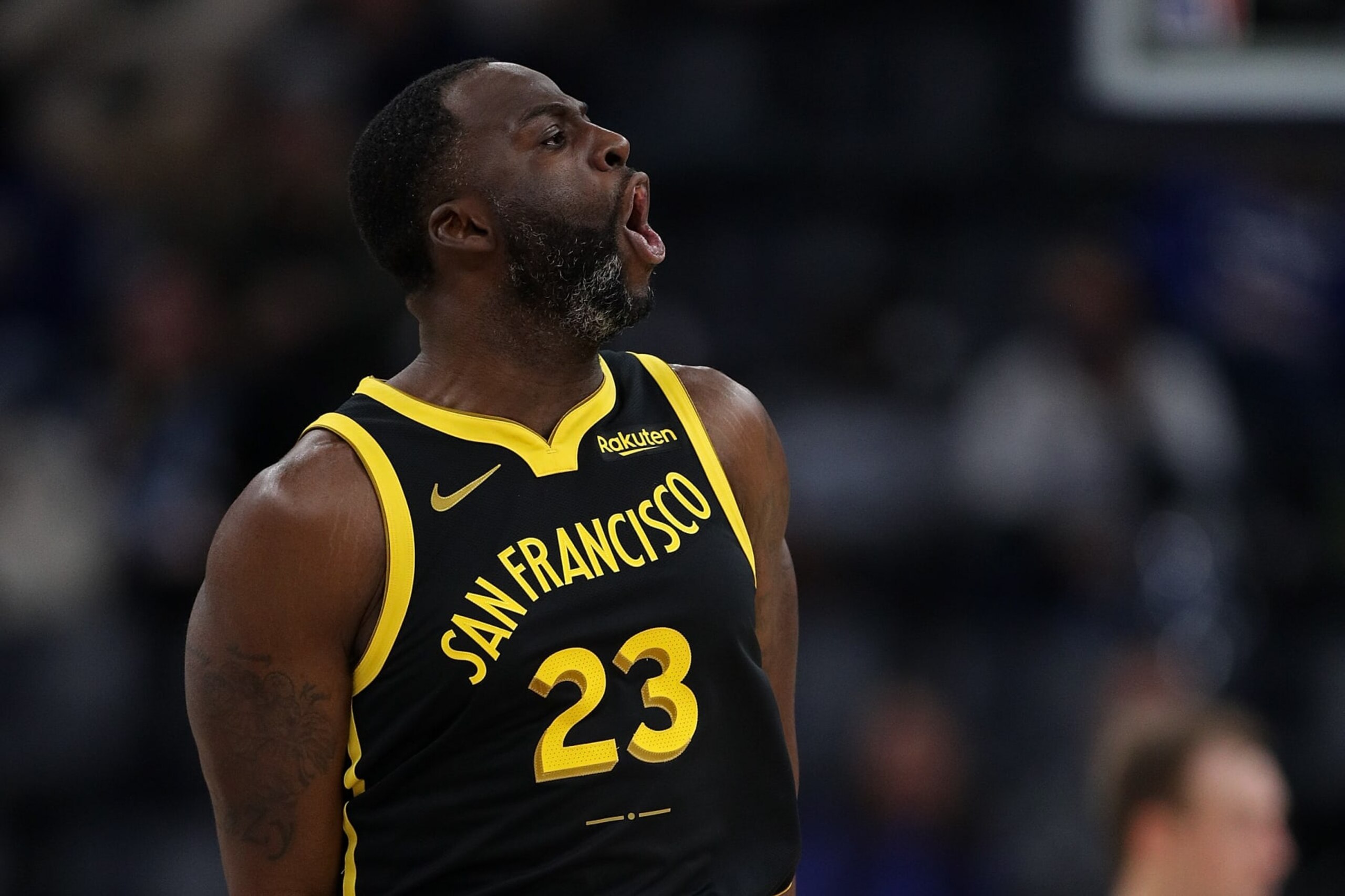 MEMPHIS, TENNESSEE - JANUARY 15: Draymond Green #23 of the Golden State Warriors reacts during the first half against the Memphis Grizzlies at FedExForum on January 15, 2024 in Memphis, Tennessee. NOTE TO USER: User expressly acknowledges and agrees that, by downloading and or using this photograph, User is consenting to the terms and conditions of the Getty Images License Agreement. (Photo by Justin Ford/Getty Images)