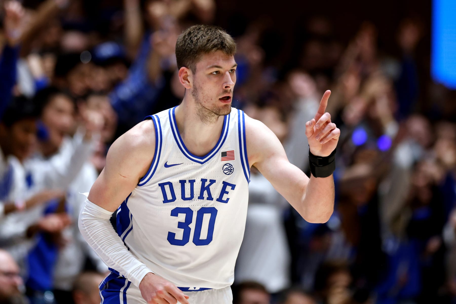 DURHAM, NORTH CAROLINA - JANUARY 13: Kyle Filipowski #30 of the Duke Blue Devils reacts following a three-point basket during the first half of the game against the Georgia Tech Yellow Jackets at Cameron Indoor Stadium on January 13, 2024 in Durham, North Carolina. (Photo by Lance King/Getty Images)