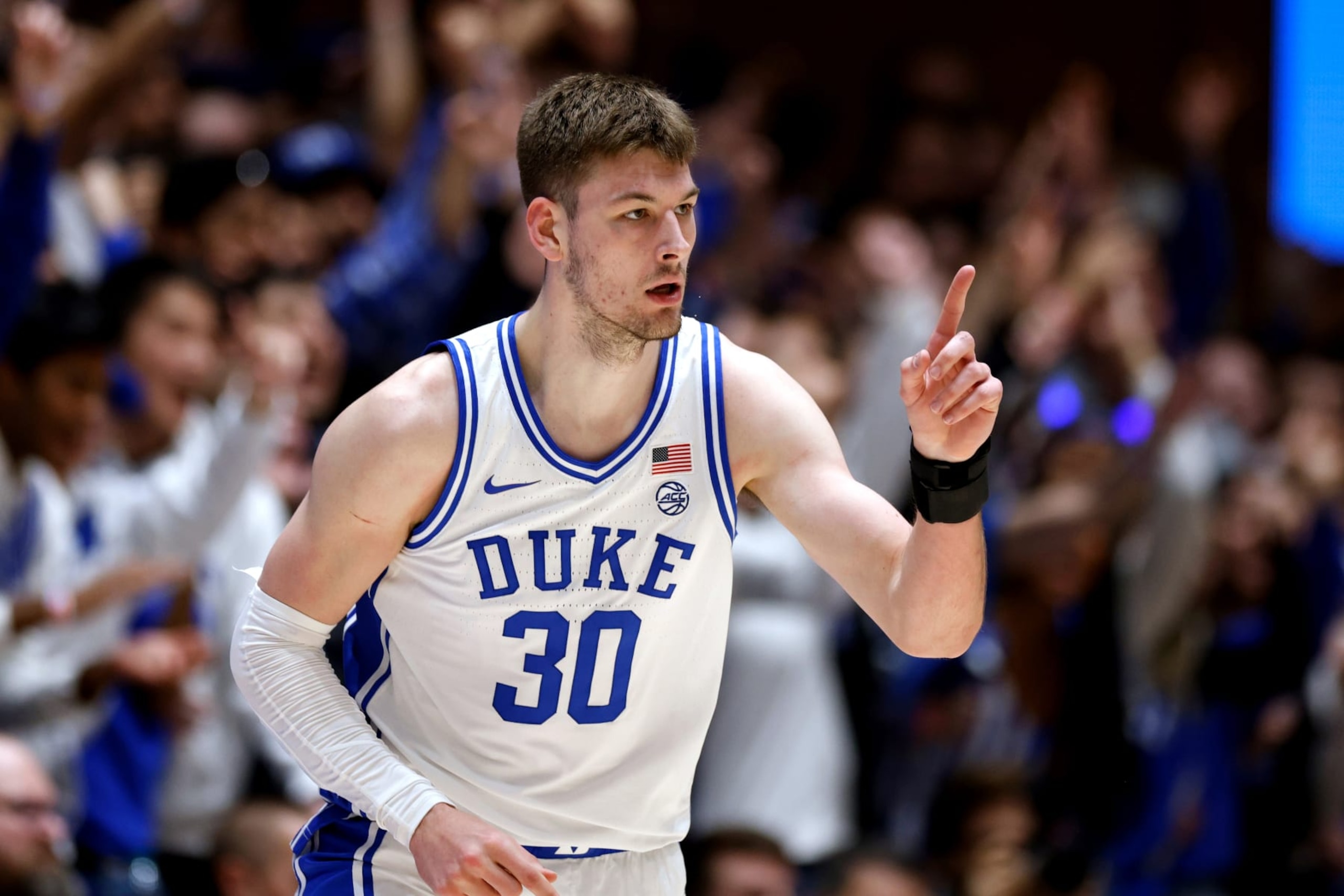 DURHAM, NORTH CAROLINA - JANUARY 13: Kyle Filipowski #30 of the Duke Blue Devils reacts following a three-point basket during the first half of the game against the Georgia Tech Yellow Jackets at Cameron Indoor Stadium on January 13, 2024 in Durham, North Carolina. (Photo by Lance King/Getty Images)