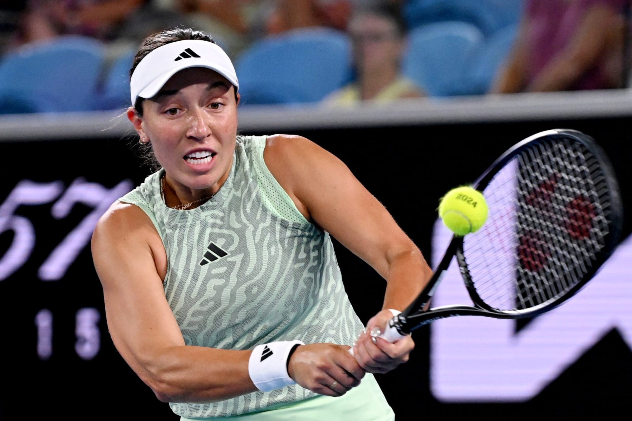 MELBOURNE, AUSTRALIA - JANUARY 16: Jessica Pegula of the United States plays a backhand in their first round match against Rebecca Marino of Canada during the 2024 Australian Open at Melbourne Park on January 16, 2024 in Melbourne, Australia. (Photo by Morgan Hancock/Getty Images) MELBOURNE, AUSTRALIA - JANUARY 16: Jessica Pegula of the United States plays a backhand in their first round match against Rebecca Marino of Canada during the 2024 Australian Open at Melbourne Park on January 16, 2024 in Melbourne, Australia. (Photo by Morgan Hancock/Getty Images)