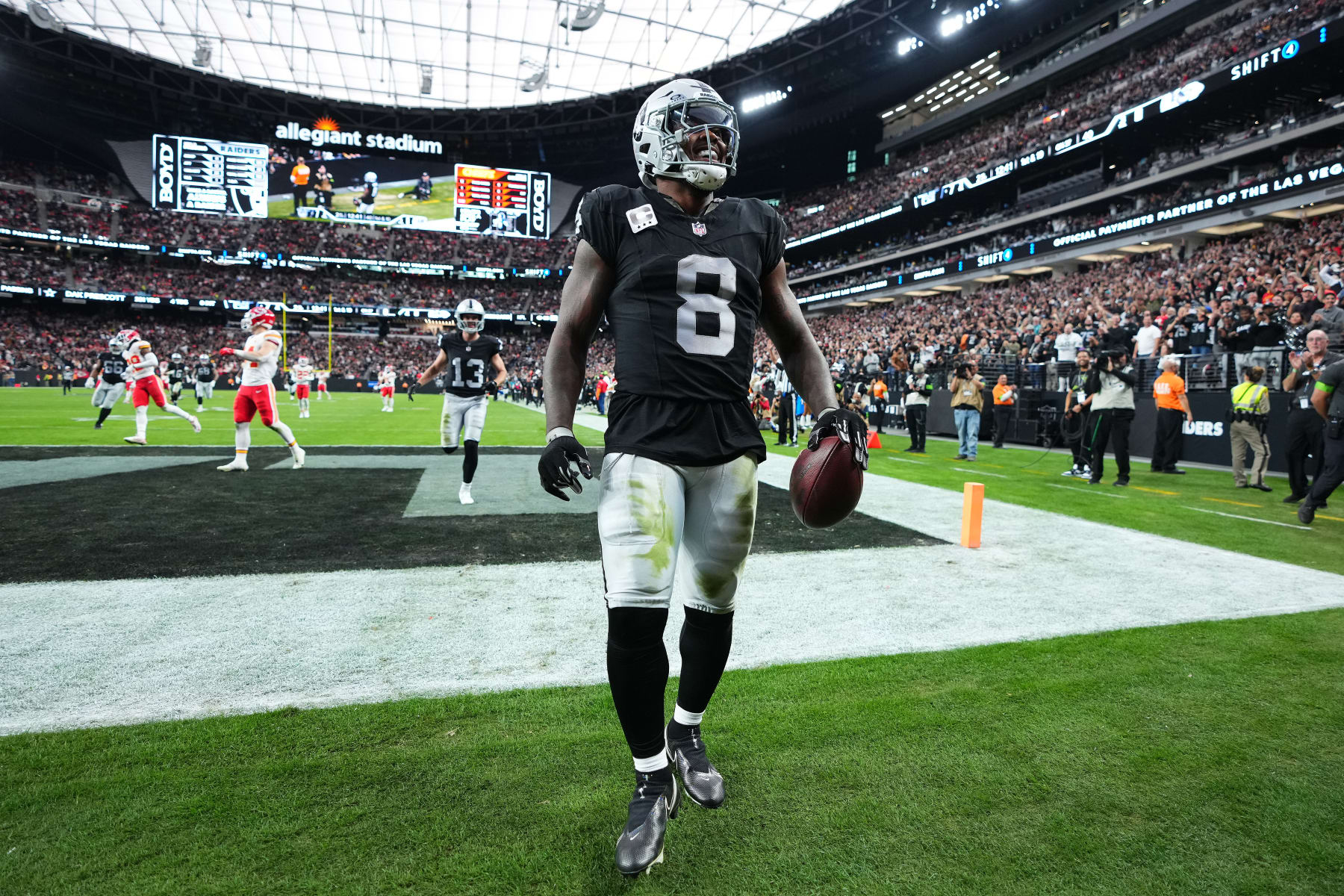 LAS VEGAS, NEVADA - NOVEMBER 26: Josh Jacobs #8 of the Las Vegas Raiders reacts after scoring a second quarter touchdown  against the Kansas City Chiefs at Allegiant Stadium on November 26, 2023 in Las Vegas, Nevada. (Photo by Jeff Bottari/Getty Images)