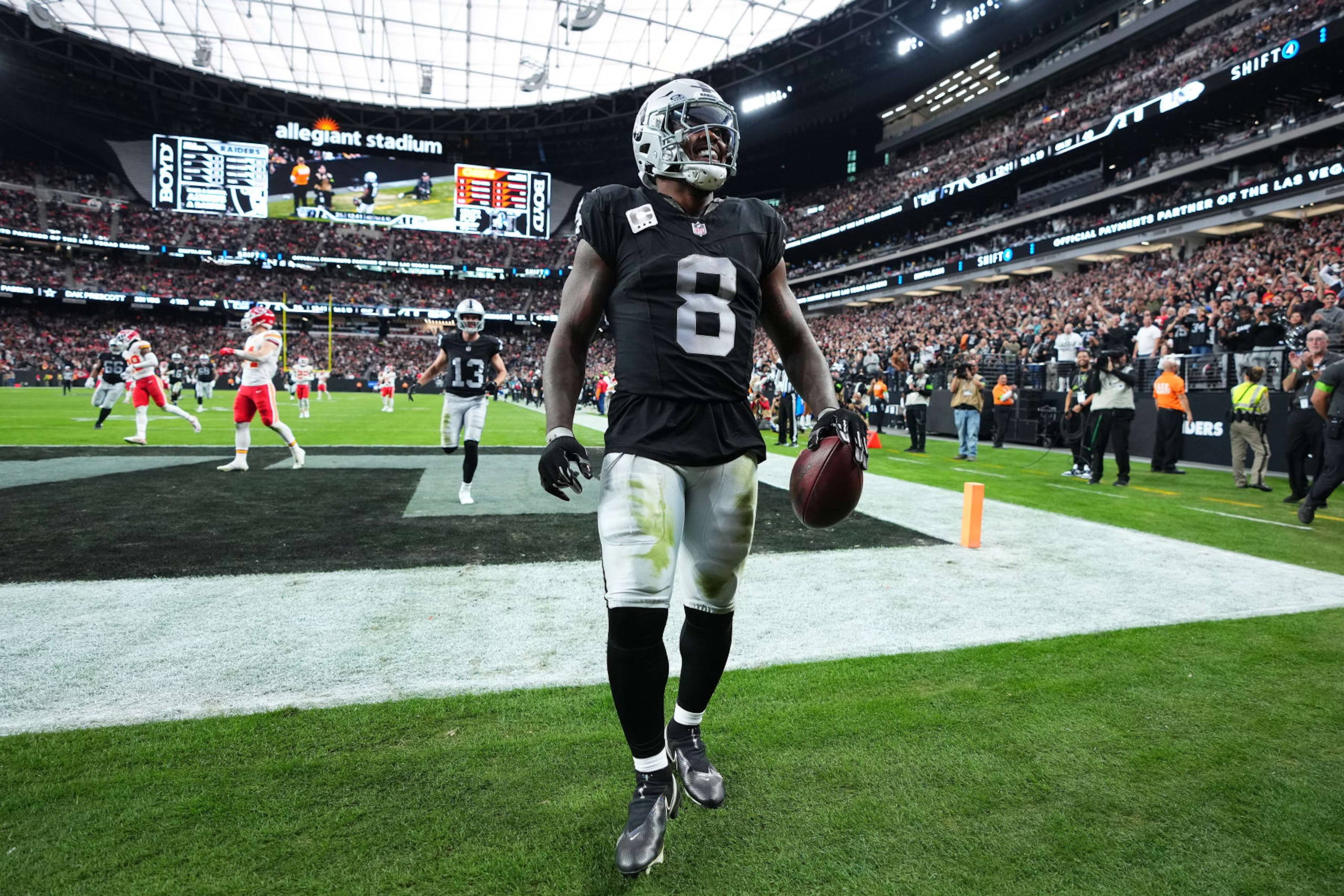 LAS VEGAS, NEVADA - NOVEMBER 26: Josh Jacobs #8 of the Las Vegas Raiders reacts after scoring a second quarter touchdown  against the Kansas City Chiefs at Allegiant Stadium on November 26, 2023 in Las Vegas, Nevada. (Photo by Jeff Bottari/Getty Images)