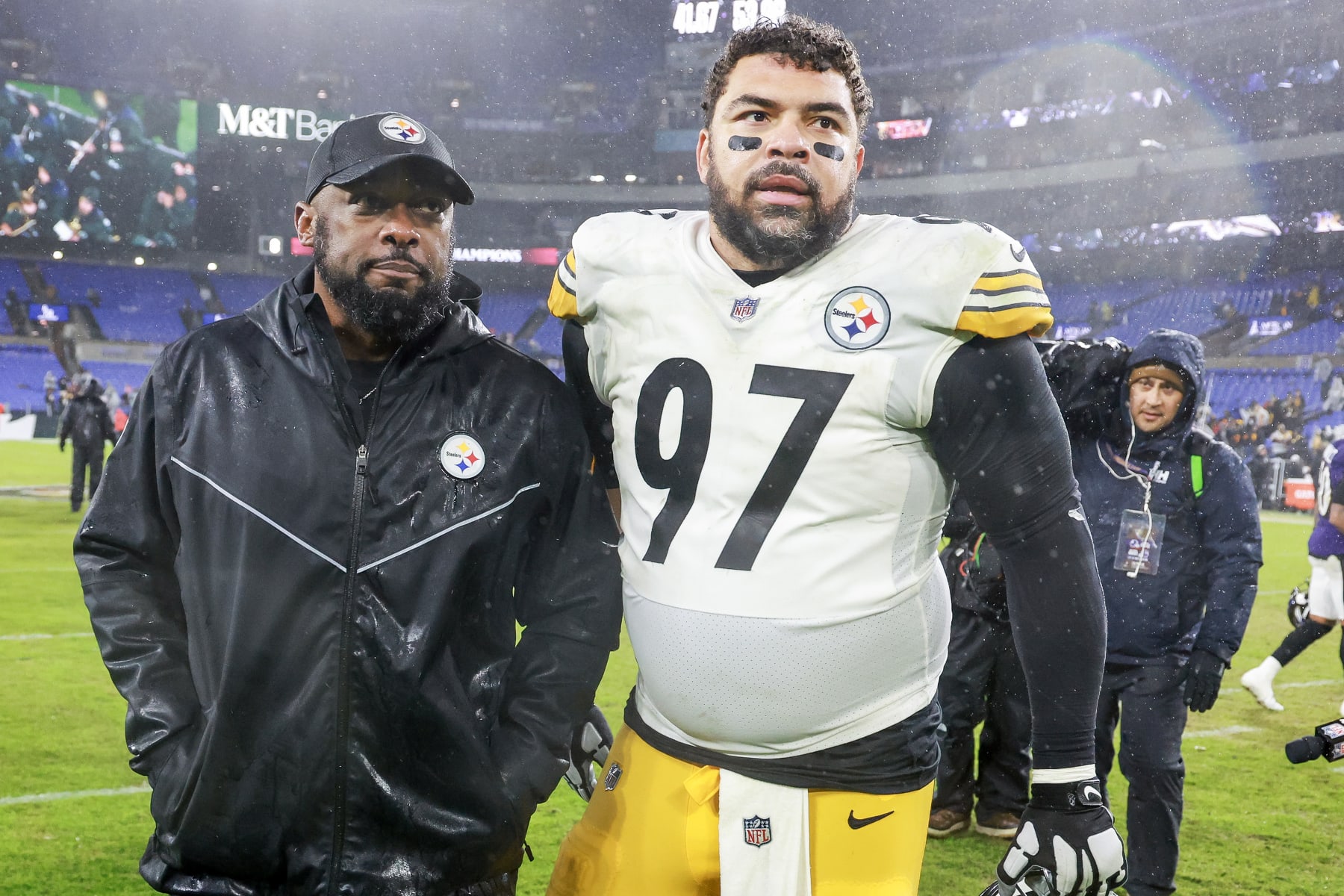 BALTIMORE, MARYLAND - JANUARY 06: Head coach Mike Tomlin of the Pittsburgh Steelers and Cameron Heyward #97 walk off the field after the Steelers defeated the Baltimore Ravens, 17-10, at M&T Bank Stadium on January 06, 2024 in Baltimore, Maryland. (Photo by Rob Carr/Getty Images)