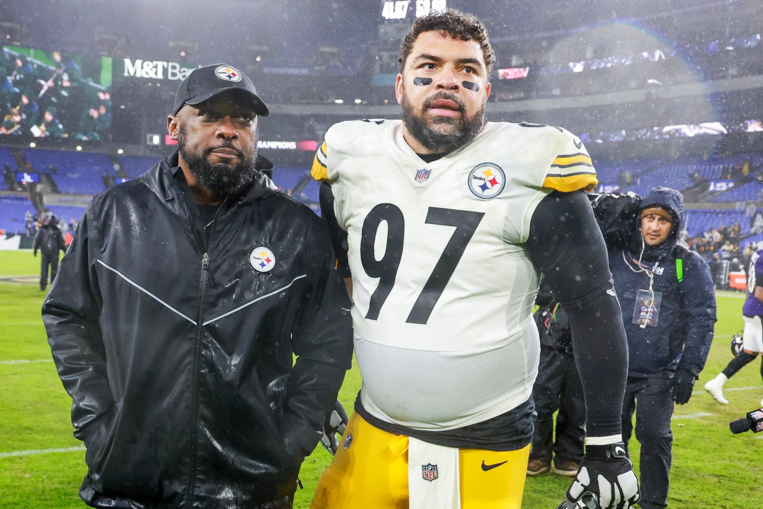 BALTIMORE, MARYLAND - JANUARY 06: Head coach Mike Tomlin of the Pittsburgh Steelers and Cameron Heyward #97 walk off the field after the Steelers defeated the Baltimore Ravens, 17-10, at M&T Bank Stadium on January 06, 2024 in Baltimore, Maryland. (Photo by Rob Carr/Getty Images)