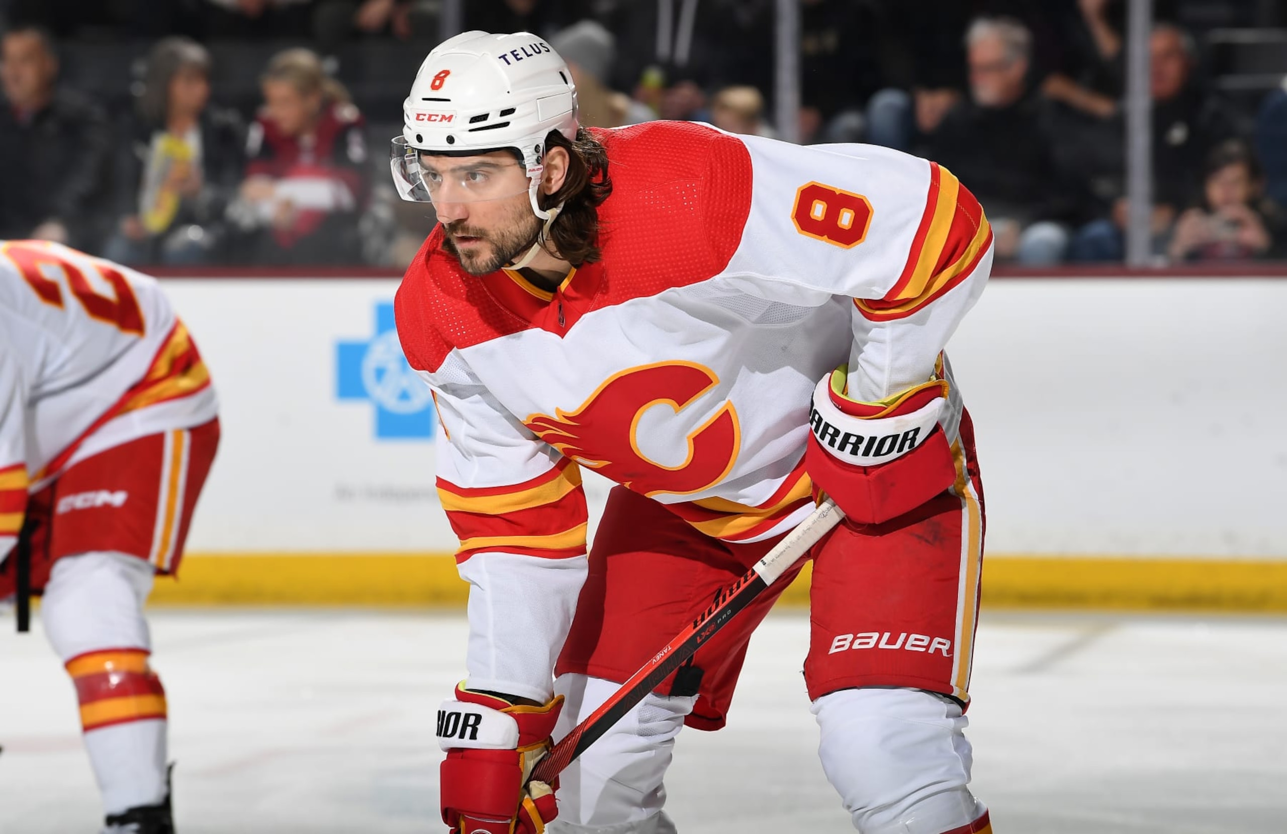 TEMPE, ARIZONA - JANUARY 11: Chris Tanev #8 of the Calgary Flames gets ready during a face off against the Arizona Coyotes at Mullett Arena on January 11, 2024 in Tempe, Arizona. (Photo by Norm Hall/NHLI via Getty Images)