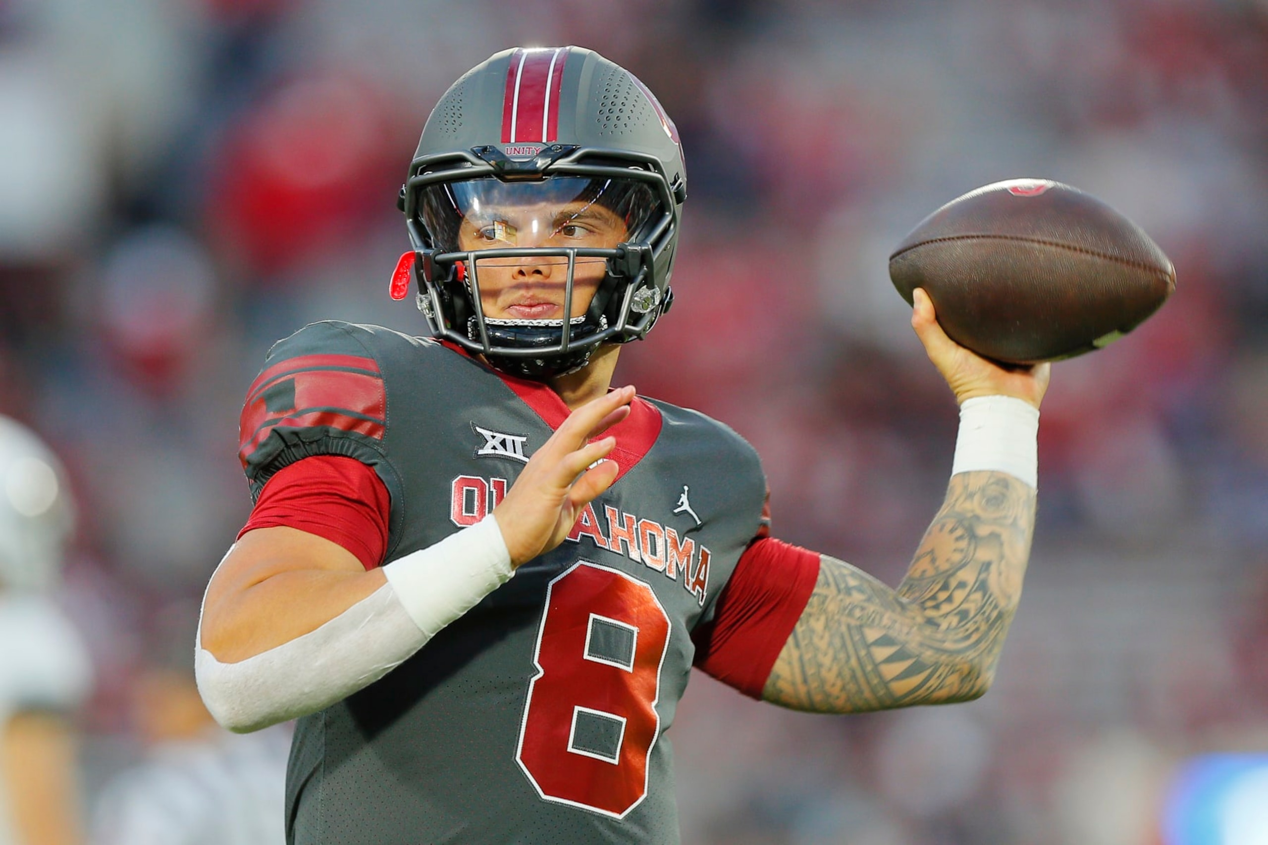 NORMAN, OKLAHOMA - NOVEMBER 11:  Quarterback Dillon Gabriel #8 of the Oklahoma Sooners throws passes before a game against the West Virginia Mountaineers at Gaylord Family Oklahoma Memorial Stadium on November 11, 2023 in Norman, Oklahoma.  (Photo by Brian Bahr/Getty Images)