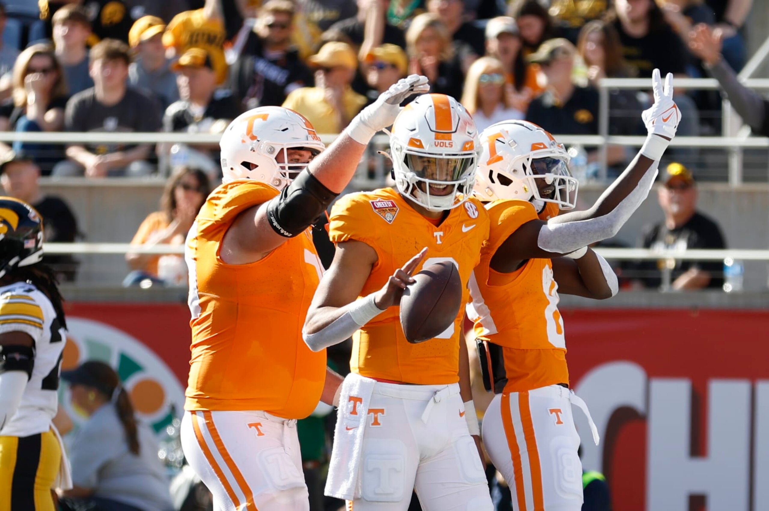 ORLANDO, FL - JANUARY 01: Tennessee Volunteers quarterback Nico Iamaleava (8) celebrates a touchdown with teammates during the game between the Tennessee Volunteers and the Iowa Hawkeyes on January 1, 2024 at Camping World Stadium in Orlando, Fl. (Photo by David Rosenblum/Icon Sportswire via Getty Images)