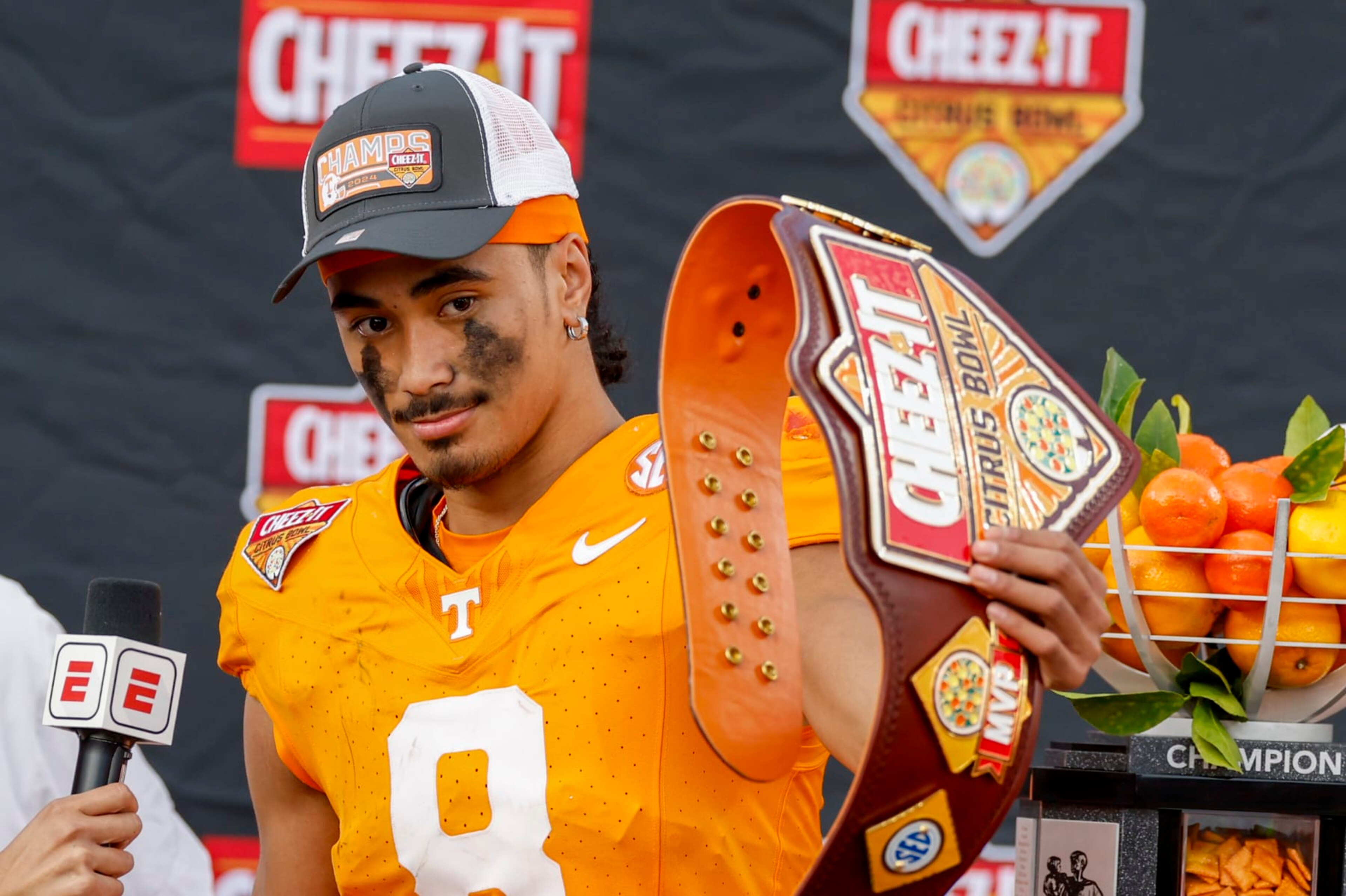 ORLANDO, FL - JANUARY 01: Tennessee Volunteers quarterback Nico Iamaleava (8) holds the award for the MVP of the game after the game between the Tennessee Volunteers and the Iowa Hawkeyes on January 1, 2024 at Camping World Stadium in Orlando, Fl. (Photo by David Rosenblum/Icon Sportswire via Getty Images)