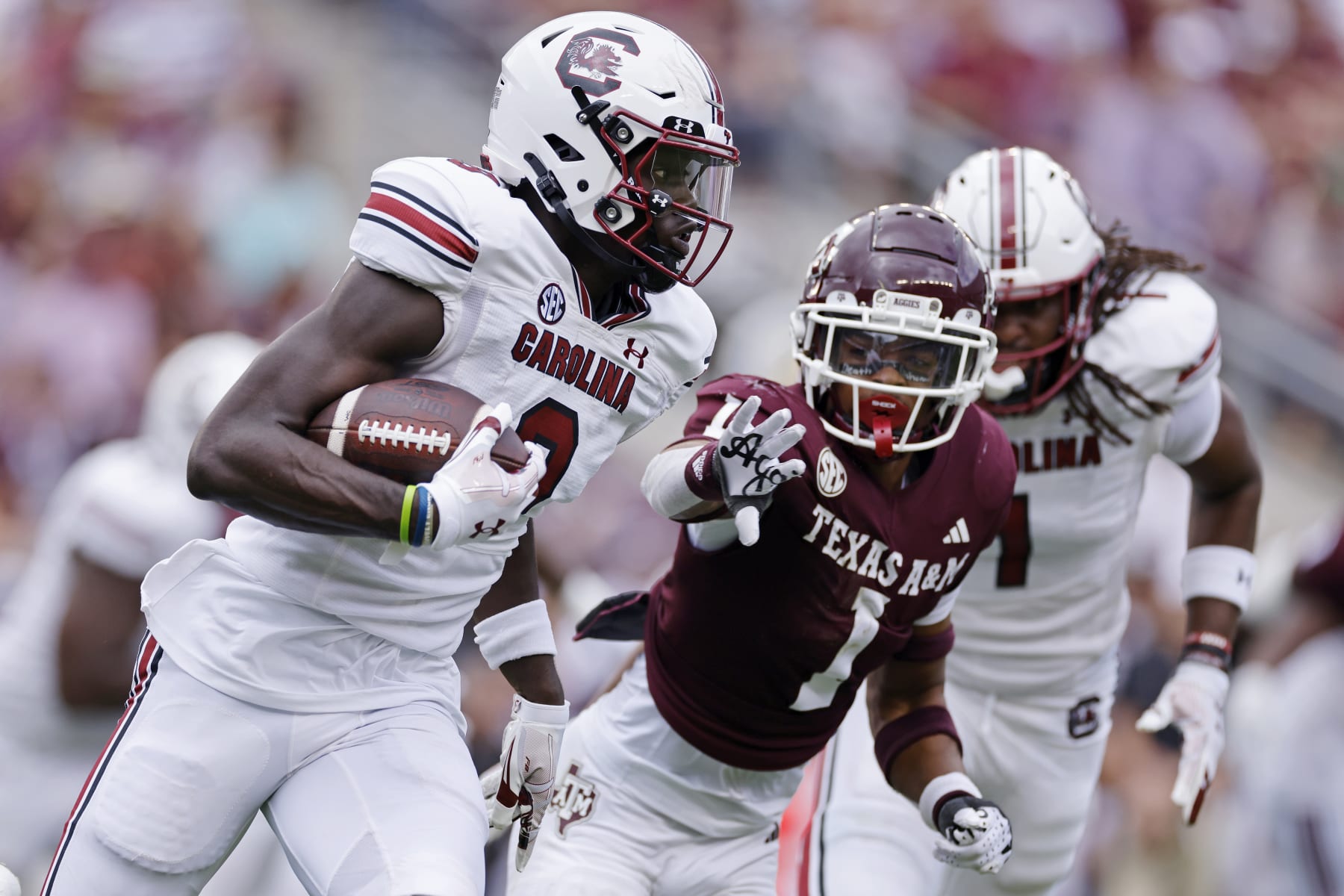 COLLEGE STATION, TX - OCTOBER 28: South Carolina Gamecocks wide receiver Nyck Harbor (8) runs with the ball while pursued by Texas A&M Aggies defensive back Bryce Anderson (1) during a college football game on October 28, 2023 at Kyle Field in College Station, Texas. (Photo by Joe Robbins/Icon Sportswire via Getty Images)