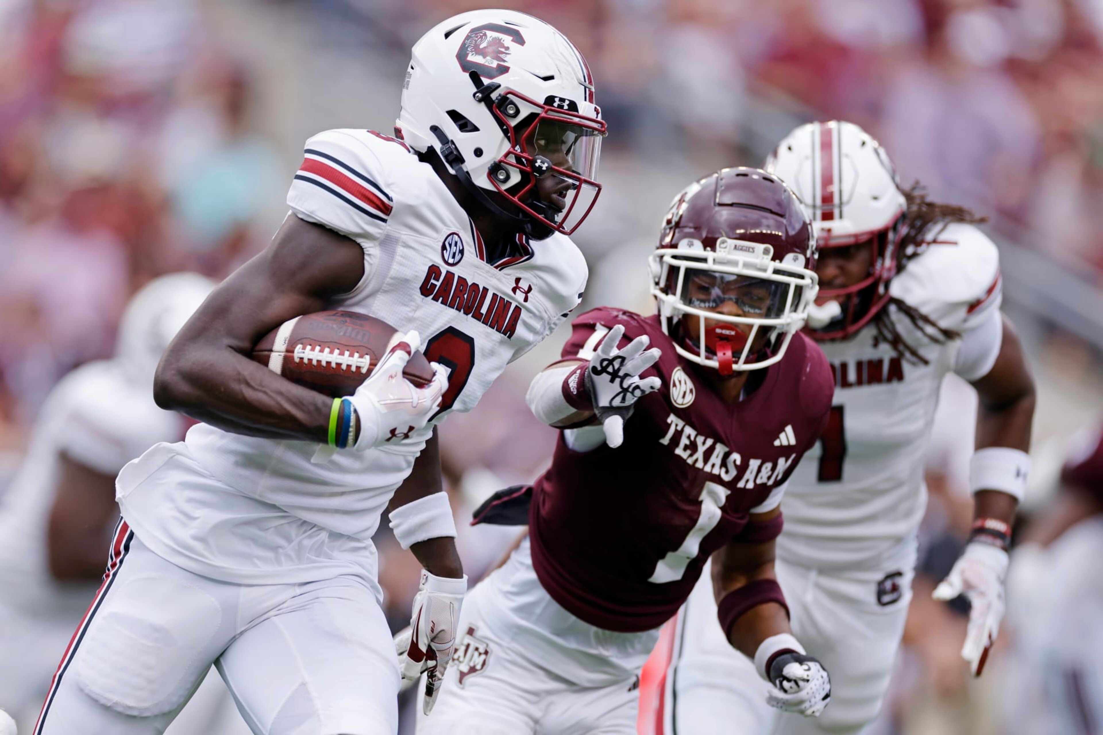 COLLEGE STATION, TX - OCTOBER 28: South Carolina Gamecocks wide receiver Nyck Harbor (8) runs with the ball while pursued by Texas A&M Aggies defensive back Bryce Anderson (1) during a college football game on October 28, 2023 at Kyle Field in College Station, Texas. (Photo by Joe Robbins/Icon Sportswire via Getty Images)