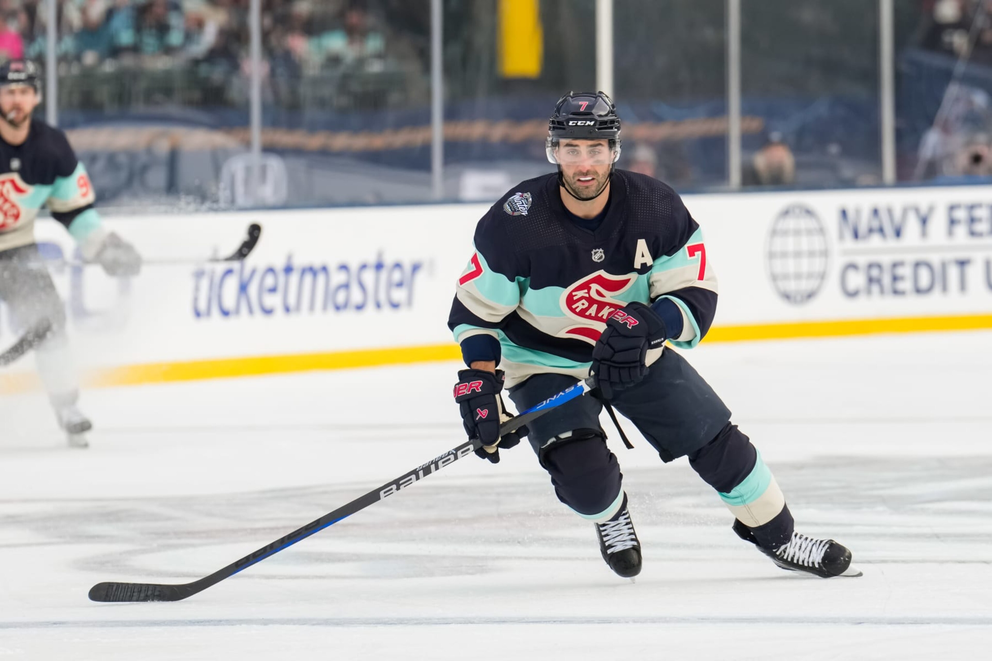 SEATTLE, WASHINGTON - JANUARY 01: Jordan Eberle #7 of the Seattle Kraken skates during the third period of the 2024 Discover NHL Winter Classic against the Vegas Golden Knights at T-Mobile Park on January 01, 2024 in Seattle, Washington. (Photo by Christopher Mast/NHLI via Getty Images) SEATTLE, WASHINGTON - JANUARY 01: Jordan Eberle #7 of the Seattle Kraken skates during the third period of the 2024 Discover NHL Winter Classic against the Vegas Golden Knights at T-Mobile Park on January 01, 2024 in Seattle, Washington. (Photo by Christopher Mast/NHLI via Getty Images)