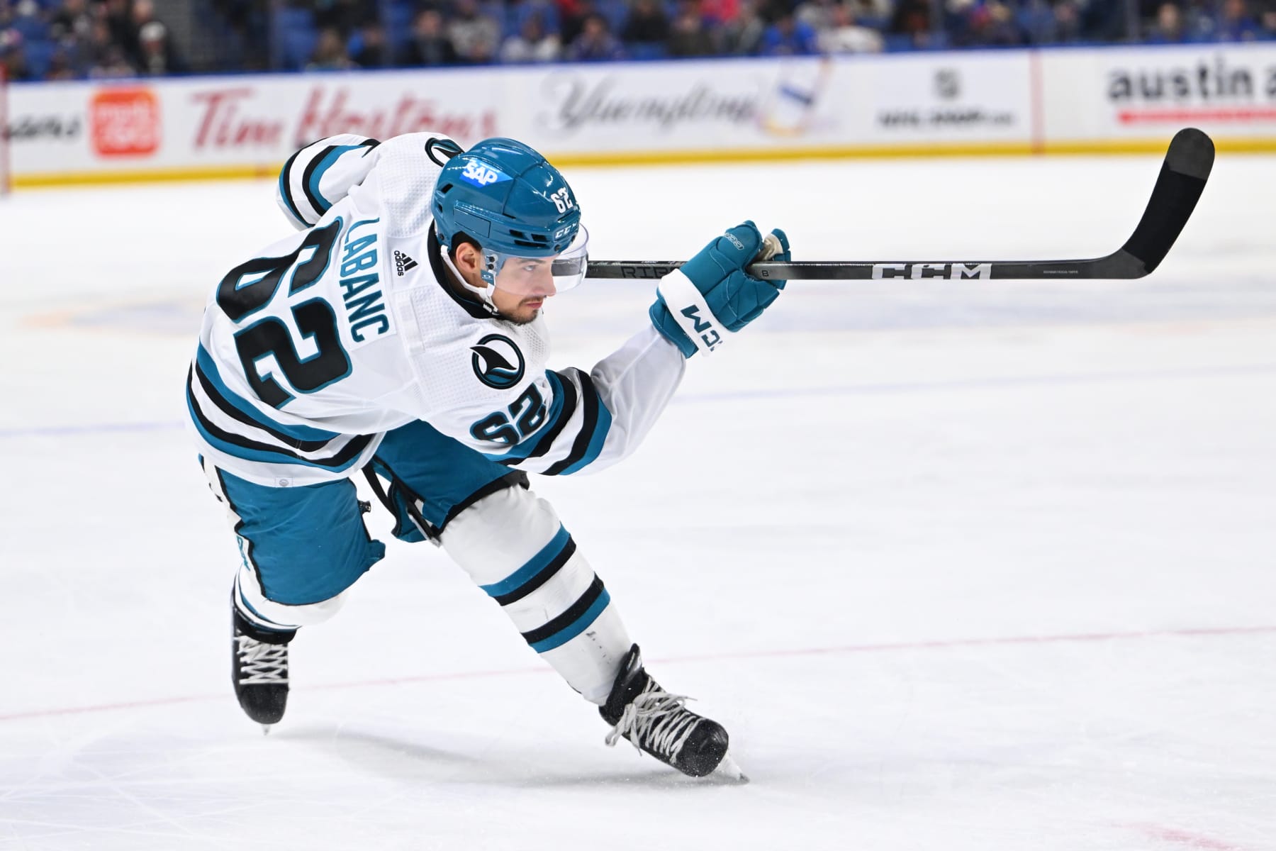 BUFFALO, NEW YORK - JANUARY 15: Kevin Labanc #62 of the San Jose Sharks shoots the puck against the Buffalo Sabres during an NHL game on January 15, 2024 at KeyBank Center in Buffalo, New York. (Photo by Joe Hrycych/NHLI via Getty Images)