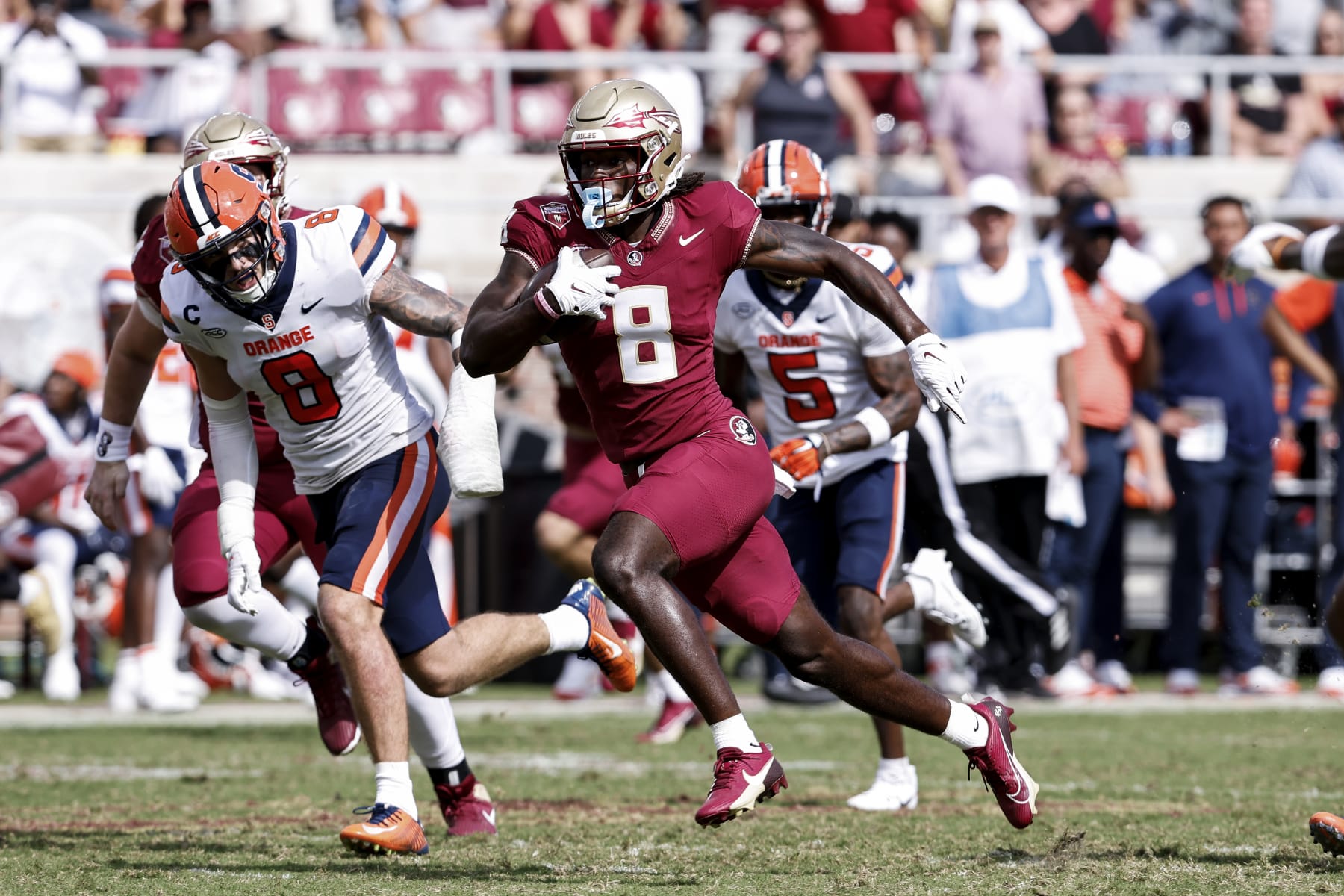 TALLAHASSEE, FL - OCTOBER 14: Wide Receiver Hykeem Williams #8 of the Florida State Seminoles on a catch and run for a touchdown during the game against the Syracuse Orange at Doak Campbell Stadium on Bobby Bowden Field on October 14, 2023 in Tallahassee, Florida. The 4th ranked Seminoles defeated the Orange 41 to 3. (Photo by Don Juan Moore/Getty Images)