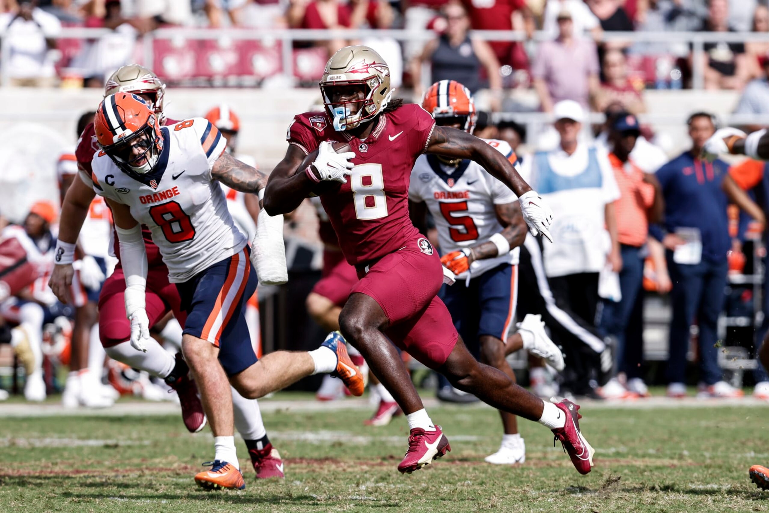 TALLAHASSEE, FL - OCTOBER 14: Wide Receiver Hykeem Williams #8 of the Florida State Seminoles on a catch and run for a touchdown during the game against the Syracuse Orange at Doak Campbell Stadium on Bobby Bowden Field on October 14, 2023 in Tallahassee, Florida. The 4th ranked Seminoles defeated the Orange 41 to 3. (Photo by Don Juan Moore/Getty Images)