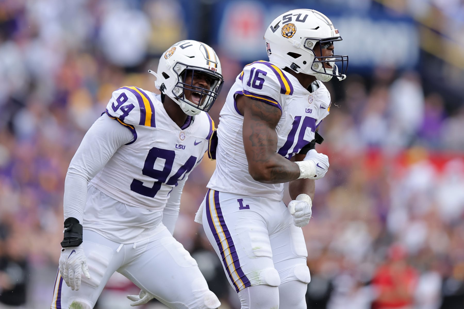 BATON ROUGE, LOUISIANA - NOVEMBER 25: Da'Shawn Womack #16 of the LSU Tigers celebrates a sack during the second half against the Texas A&M Aggies at Tiger Stadium on November 25, 2023 in Baton Rouge, Louisiana. (Photo by Jonathan Bachman/Getty Images)