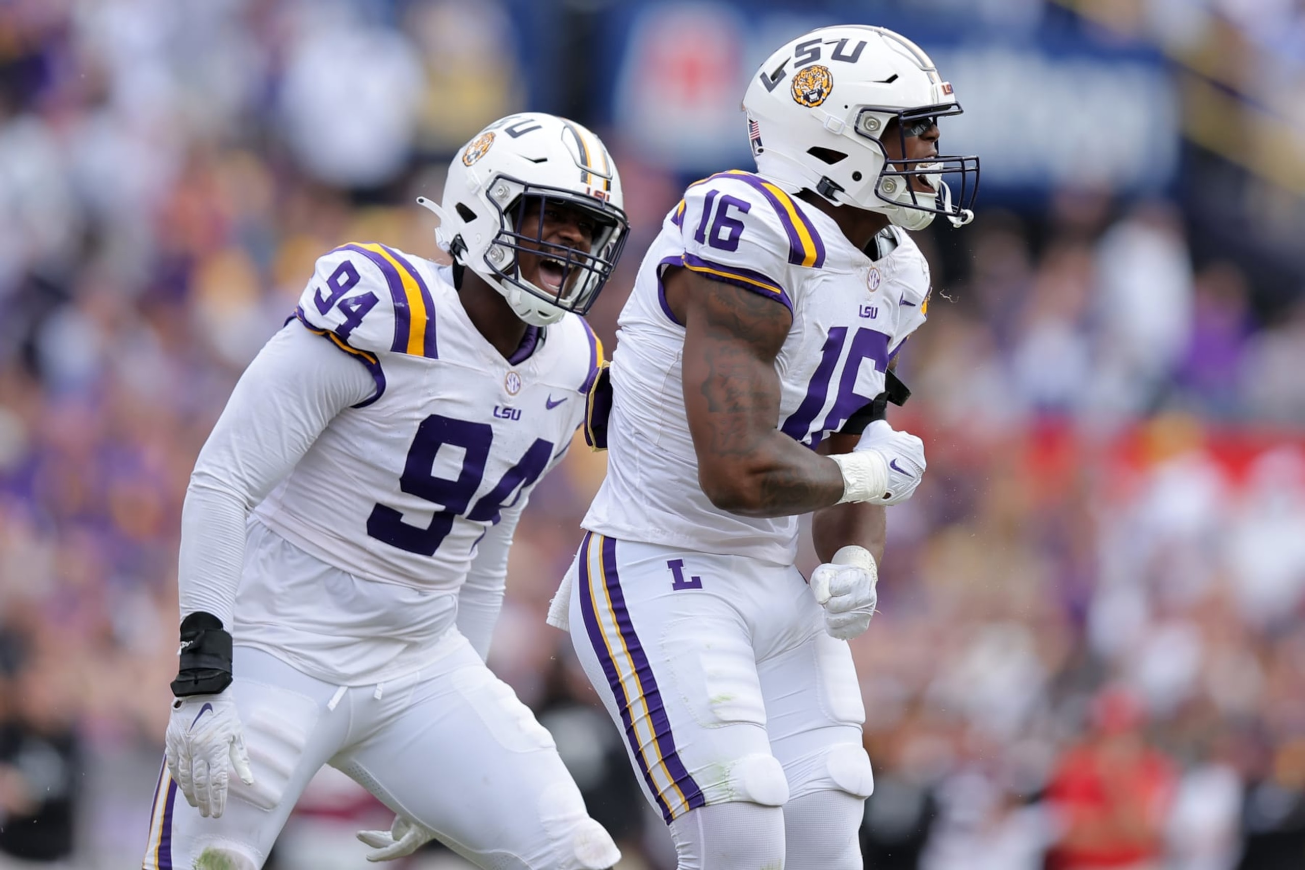 BATON ROUGE, LOUISIANA - NOVEMBER 25: Da'Shawn Womack #16 of the LSU Tigers celebrates a sack during the second half against the Texas A&M Aggies at Tiger Stadium on November 25, 2023 in Baton Rouge, Louisiana. (Photo by Jonathan Bachman/Getty Images)