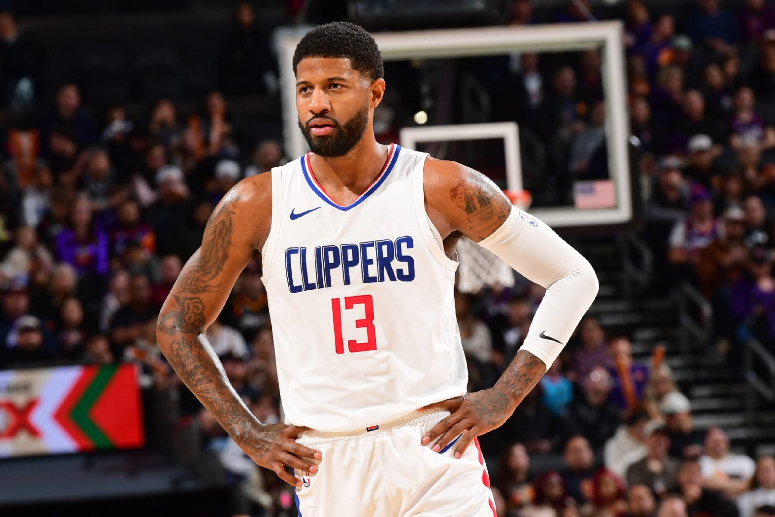 PHOENIX, AZ - JANUARY  3: Paul George #13 of the LA Clippers looks on during the game against the Phoenix Suns on January 3, 2024 at Footprint Center in Phoenix, Arizona. NOTE TO USER: User expressly acknowledges and agrees that, by downloading and or using this photograph, user is consenting to the terms and conditions of the Getty Images License Agreement. Mandatory Copyright Notice: Copyright 2024 NBAE (Photo by Kate Frese/NBAE via Getty Images)