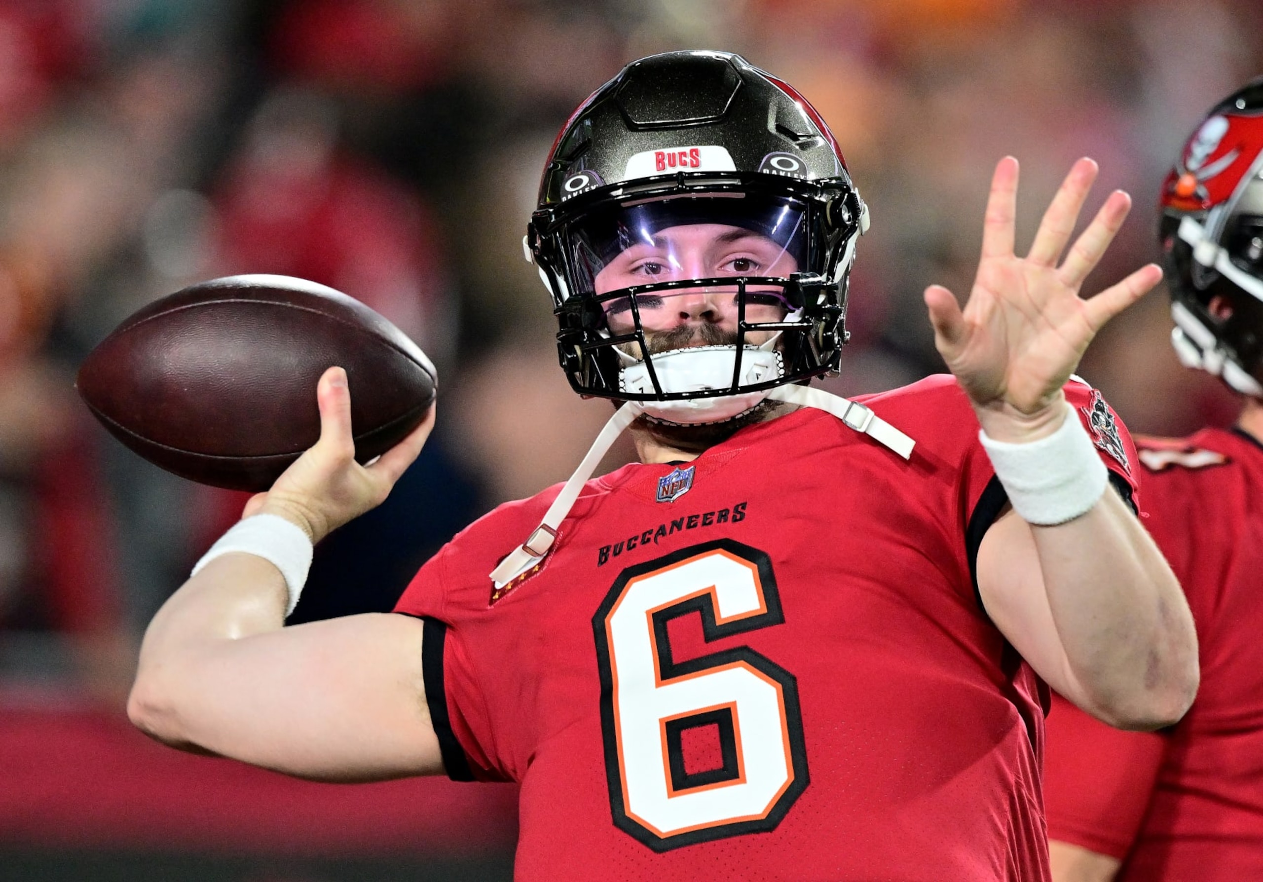 TAMPA, FLORIDA - JANUARY 15: Baker Mayfield #6 of the Tampa Bay Buccaneers warms up prior to the NFC Wild Card Playoffs against the Philadelphia Eagles at Raymond James Stadium on January 15, 2024 in Tampa, Florida. (Photo by Julio Aguilar/Getty Images)
