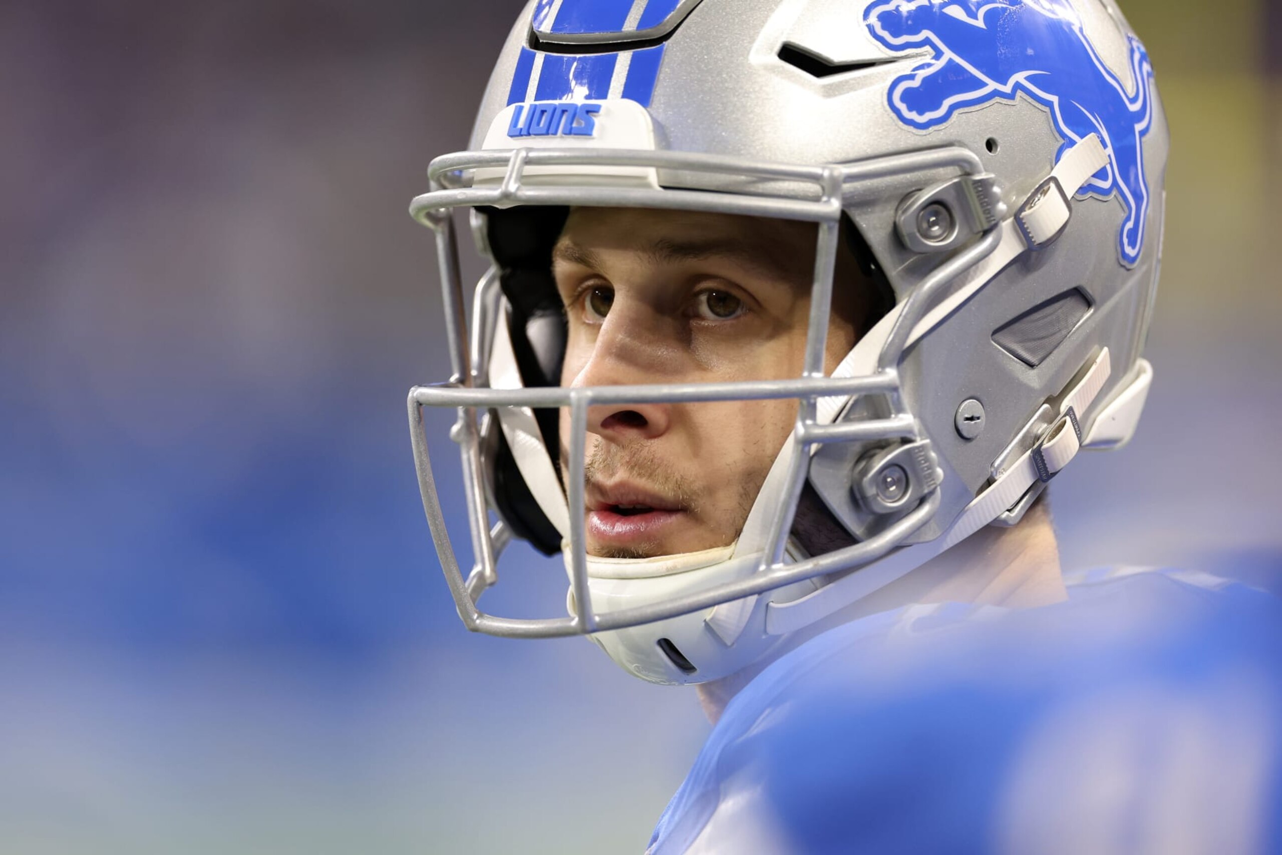 DETROIT, MICHIGAN - JANUARY 14: Jared Goff #16 of the Detroit Lions looks on during the third quarter against the Los Angeles Rams in the NFC Wild Card Playoffs at Ford Field on January 14, 2024 in Detroit, Michigan. (Photo by Gregory Shamus/Getty Images)
