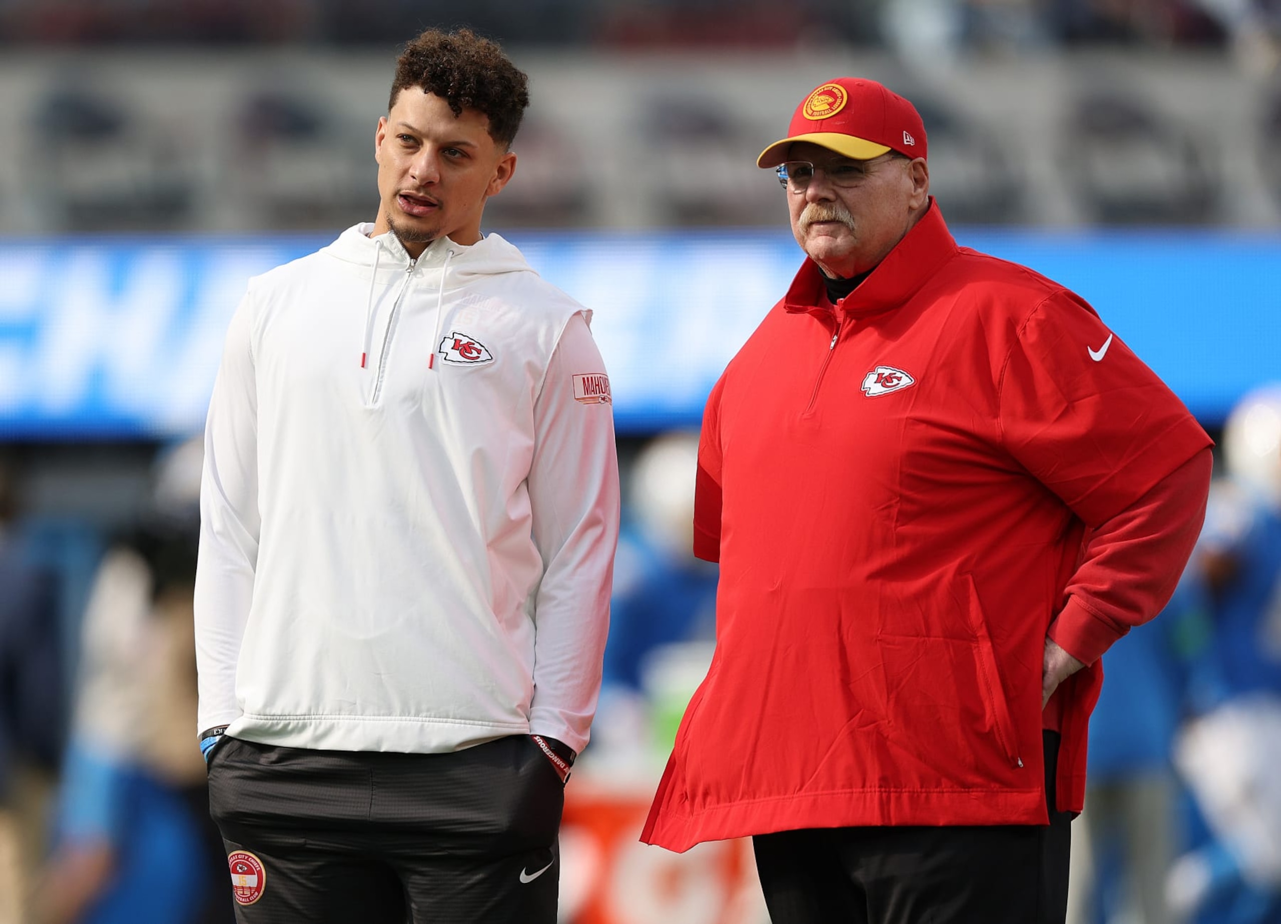 INGLEWOOD, CALIFORNIA - JANUARY 07: Patrick Mahomes #15 of the Kansas City Chiefs and head coach Andy Reid speak before a game against the Los Angeles Chargers at SoFi Stadium on January 07, 2024 in Inglewood, California. (Photo by Harry How/Getty Images)