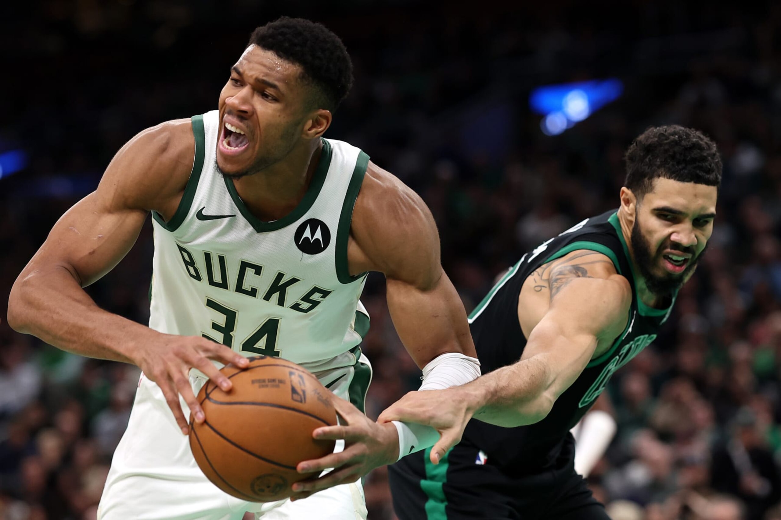 BOSTON, MASSACHUSETTS - NOVEMBER 22: Jayson Tatum #0 of the Boston Celtics defends Giannis Antetokounmpo #34 of the Milwaukee Bucks during the second half at TD Garden on November 22, 2023 in Boston, Massachusetts.  The Celtics defeat the Bucks 119-116. NOTE TO USER: User expressly acknowledges and agrees that, by downloading and or using this photograph, User is consenting to the terms and conditions of the Getty Images License Agreement.  (Photo by Maddie Meyer/Getty Images)
