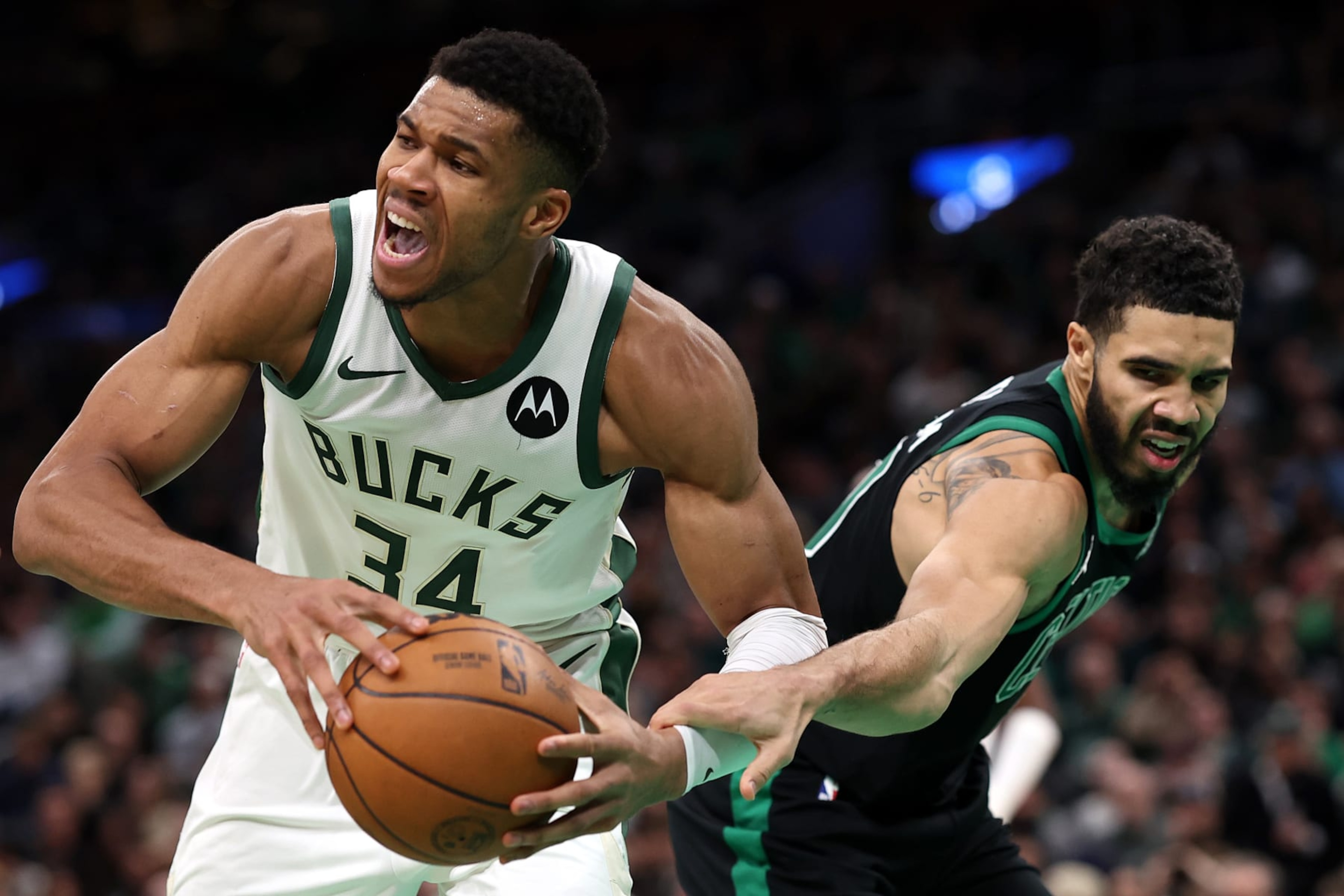 BOSTON, MASSACHUSETTS - NOVEMBER 22: Jayson Tatum #0 of the Boston Celtics defends Giannis Antetokounmpo #34 of the Milwaukee Bucks during the second half at TD Garden on November 22, 2023 in Boston, Massachusetts.  The Celtics defeat the Bucks 119-116. NOTE TO USER: User expressly acknowledges and agrees that, by downloading and or using this photograph, User is consenting to the terms and conditions of the Getty Images License Agreement.  (Photo by Maddie Meyer/Getty Images)