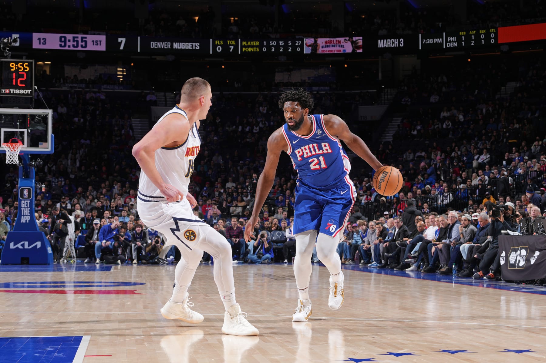 PHILADELPHIA, PA - JANUARY 16: Nikola Jokic #15 of the Denver Nuggets plays defense against Joel Embiid #21 of the Philadelphia 76ers on January 16, 2023 at the Wells Fargo Center in Philadelphia, Pennsylvania NOTE TO USER: User expressly acknowledges and agrees that, by downloading and/or using this Photograph, user is consenting to the terms and conditions of the Getty Images License Agreement. Mandatory Copyright Notice: Copyright 2024 NBAE (Photo by Jesse D. Garrabrant/NBAE via Getty Images)