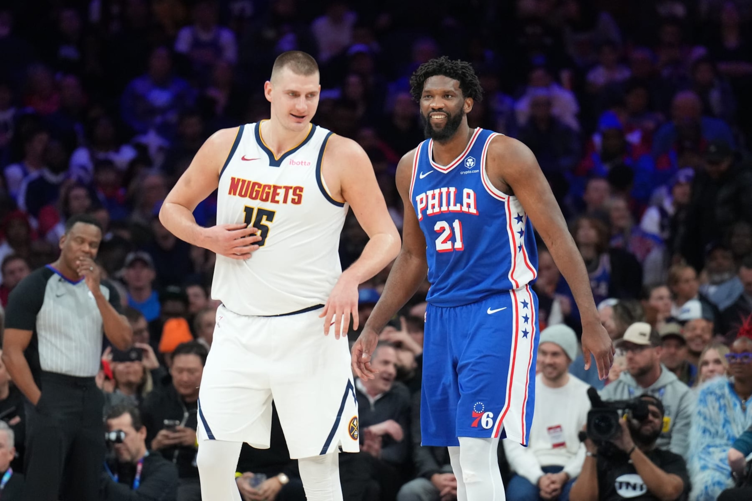 PHILADELPHIA, PA - JANUARY 16: Nikola Jokic #15 of the Denver Nuggets talks to Joel Embiid #21 of the Philadelphia 76ers during the game on January 16, 2023 at the Wells Fargo Center in Philadelphia, Pennsylvania NOTE TO USER: User expressly acknowledges and agrees that, by downloading and/or using this Photograph, user is consenting to the terms and conditions of the Getty Images License Agreement. Mandatory Copyright Notice: Copyright 2024 NBAE (Photo by Jesse D. Garrabrant/NBAE via Getty Images)