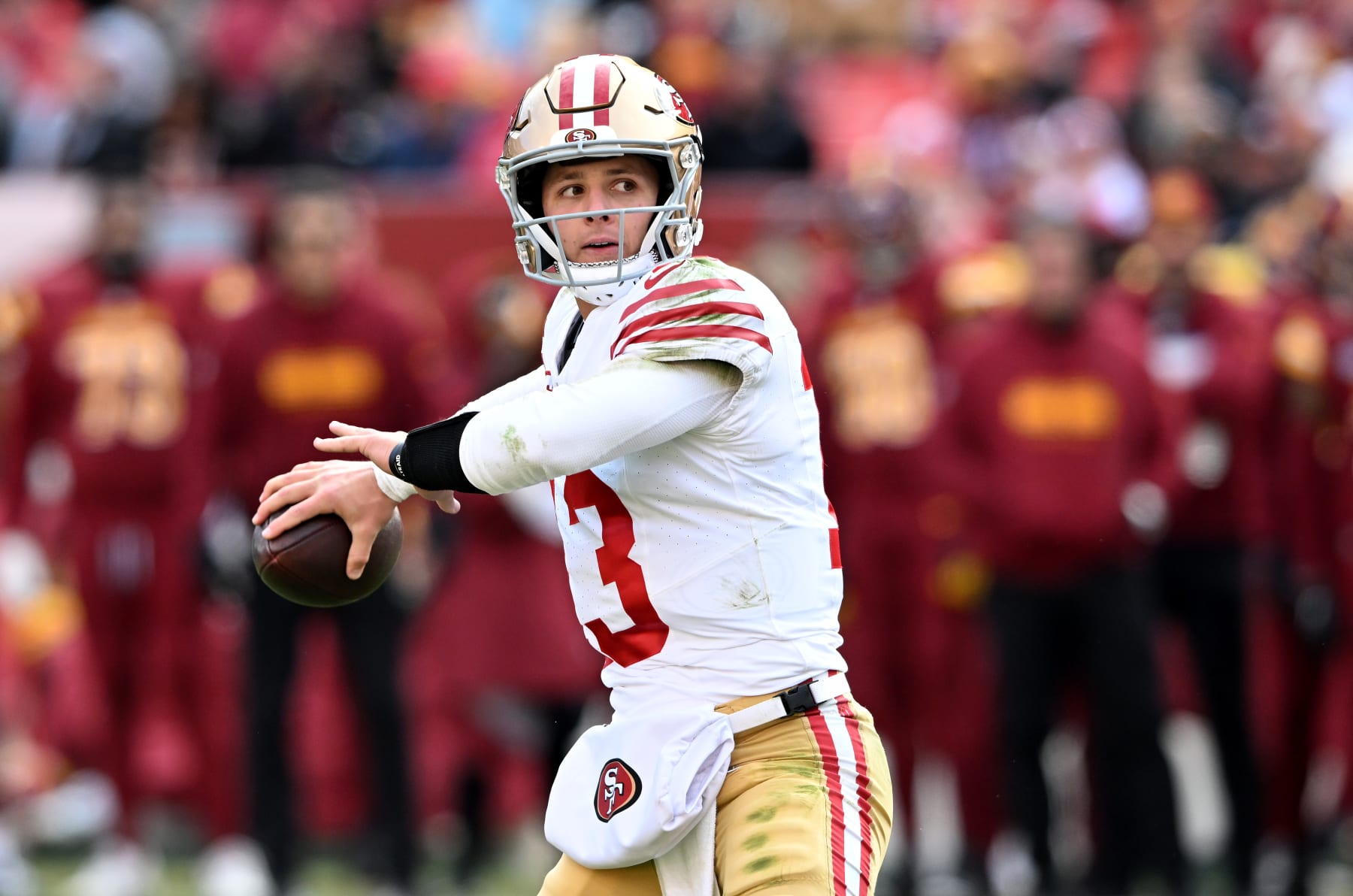 LANDOVER, MARYLAND - DECEMBER 31: Brock Purdy #13 of the San Francisco 49ers throws a pass against the Washington Commanders at FedExField on December 31, 2023 in Landover, Maryland. (Photo by G Fiume/Getty Images)