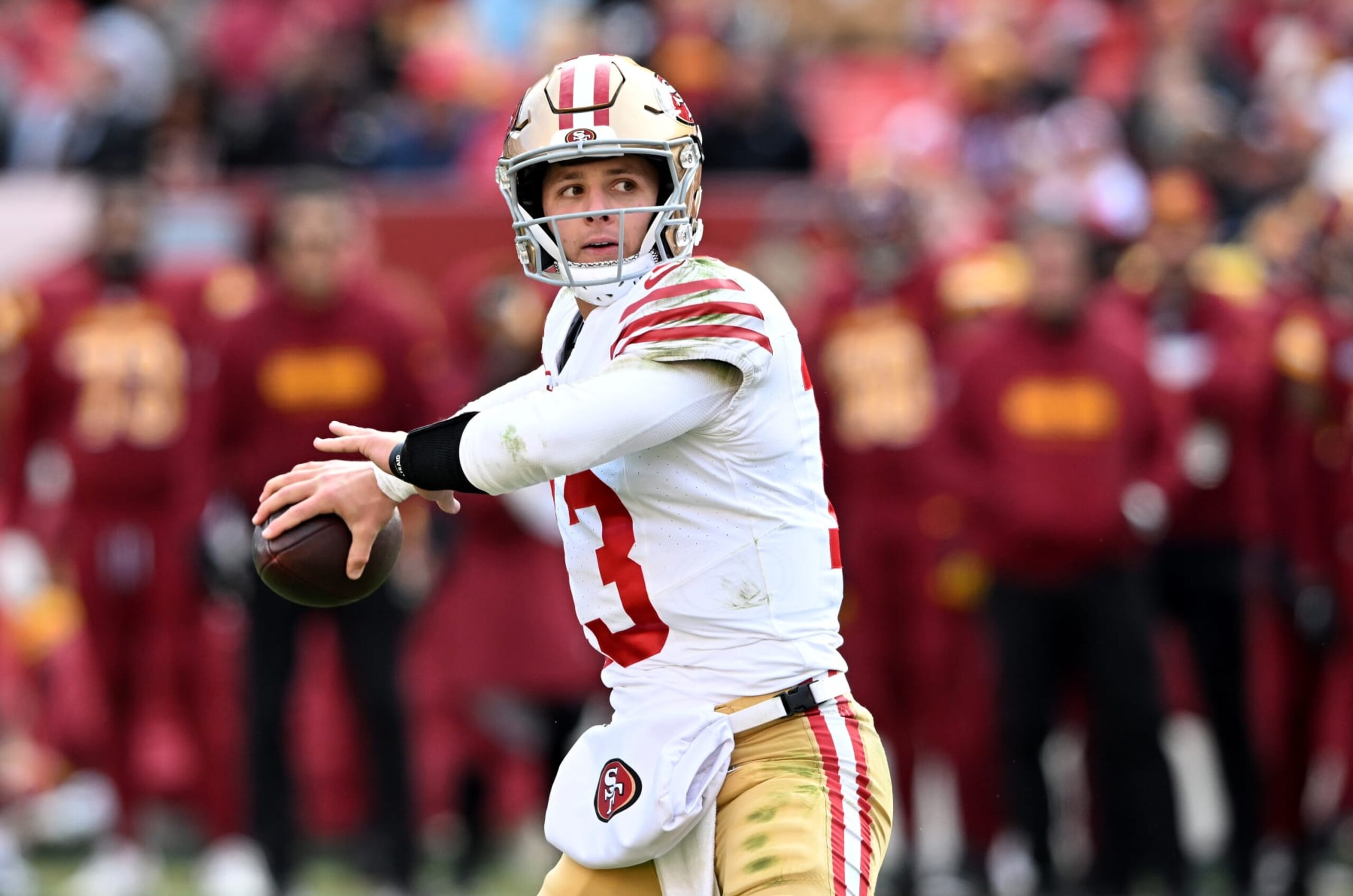LANDOVER, MARYLAND - DECEMBER 31: Brock Purdy #13 of the San Francisco 49ers throws a pass against the Washington Commanders at FedExField on December 31, 2023 in Landover, Maryland. (Photo by G Fiume/Getty Images)