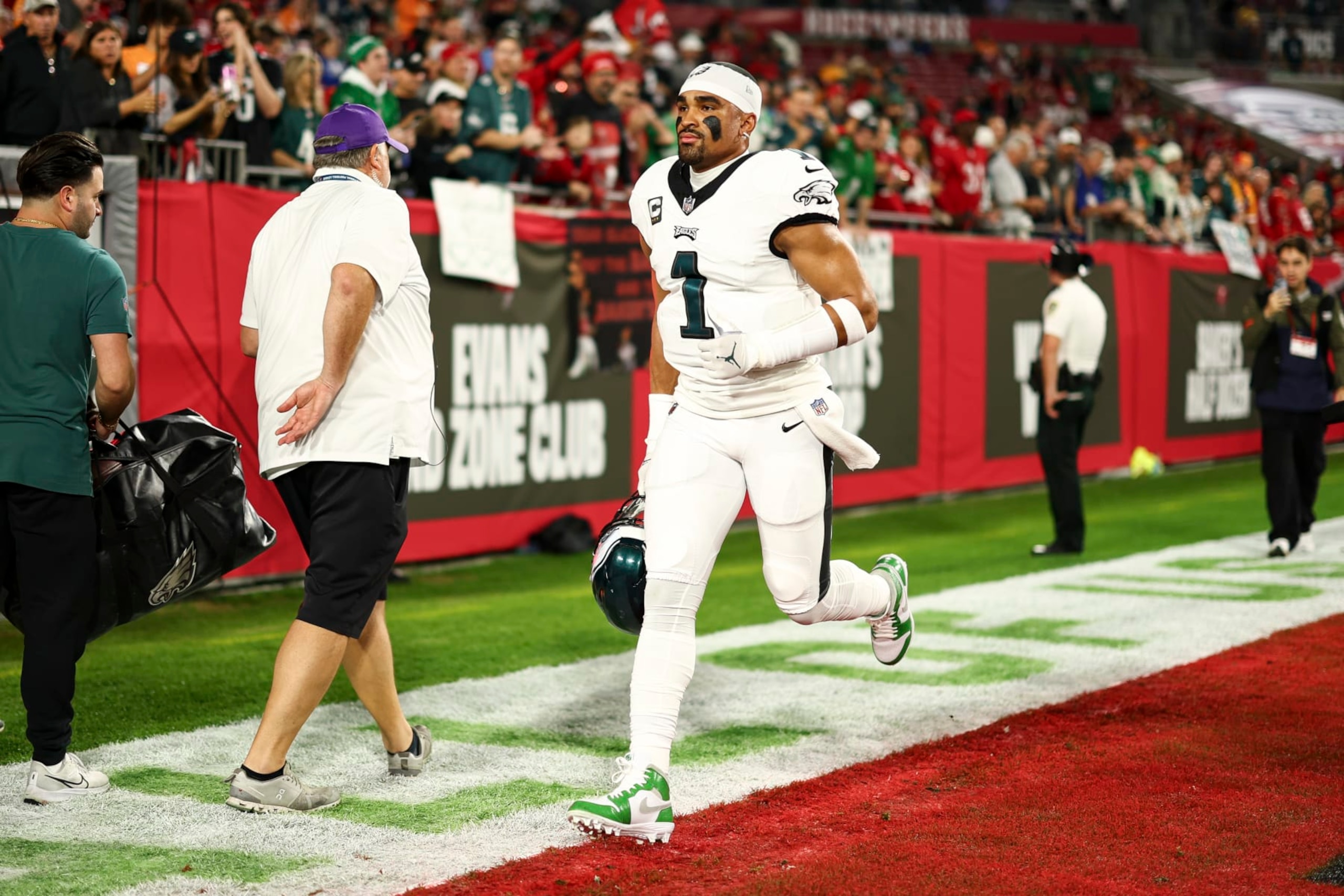 TAMPA, FL - JANUARY 15: Jalen Hurts #1 of the Philadelphia Eagles runs to the locker room prior to an NFL wild-card playoff football game against the Tampa Bay Buccaneers at Raymond James Stadium on January 15, 2024 in Tampa, Florida. (Photo by Kevin Sabitus/Getty Images) TAMPA, FL - JANUARY 15: Jalen Hurts #1 of the Philadelphia Eagles runs to the locker room prior to an NFL wild-card playoff football game against the Tampa Bay Buccaneers at Raymond James Stadium on January 15, 2024 in Tampa, Florida. (Photo by Kevin Sabitus/Getty Images)