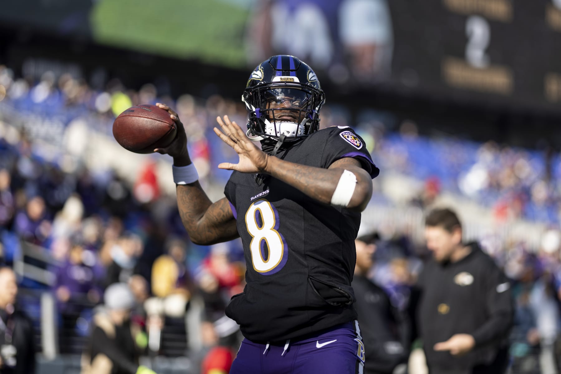 BALTIMORE, MARYLAND - DECEMBER 31: Lamar Jackson #8 of the Baltimore Ravens looks to pass as he warms up prior to an NFL football game between the Baltimore Ravens and the Miami Dolphins at M&T Bank Stadium on December 31, 2023 in Baltimore, Maryland. (Photo by Michael Owens/Getty Images)