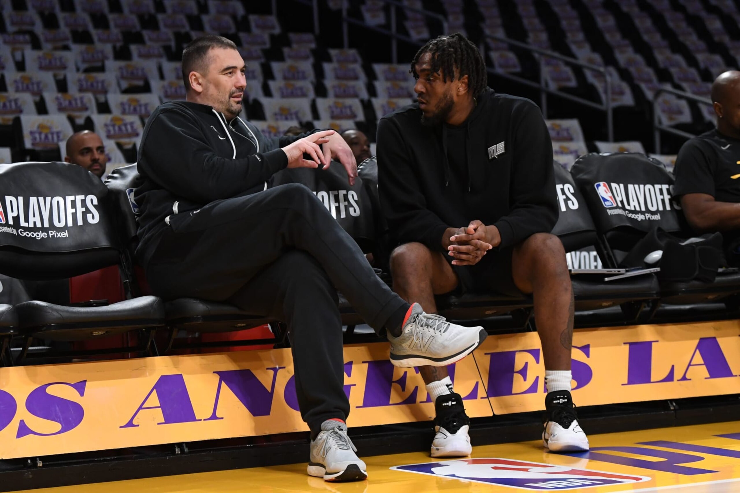 LOS ANGELES, CA - MAY 6: Assistant coach Dejan
Milojevic and Kevon Looney #5 of the Golden State Warriors talk before the game against the Los Angeles Lakers during the Western Conference Semi Finals during the 2023 NBA Playoffs on May 6, 2023 at Crypto.Com Arena in Los Angeles, California. NOTE TO USER: User expressly acknowledges and agrees that, by downloading and/or using this Photograph, user is consenting to the terms and conditions of the Getty Images License Agreement. Mandatory Copyright Notice: Copyright 2023 NBAE (Photo by Noah Graham/NBAE via Getty Images) LOS ANGELES, CA - MAY 6: Assistant coach Dejan
Milojevic and Kevon Looney #5 of the Golden State Warriors talk before the game against the Los Angeles Lakers during the Western Conference Semi Finals during the 2023 NBA Playoffs on May 6, 2023 at Crypto.Com Arena in Los Angeles, California. NOTE TO USER: User expressly acknowledges and agrees that, by downloading and/or using this Photograph, user is consenting to the terms and conditions of the Getty Images License Agreement. Mandatory Copyright Notice: Copyright 2023 NBAE (Photo by Noah Graham/NBAE via Getty Images)