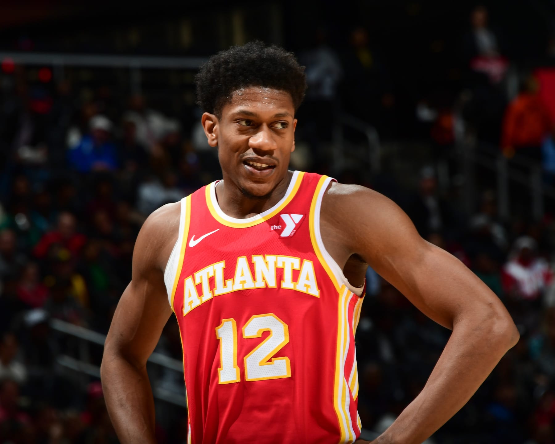 ATLANTA, GA - DECEMBER 18: De'Andre Hunter #12 of the Atlanta Hawks looks on during the game on December 18, 2023 at State Farm Arena in Atlanta, Georgia.  NOTE TO USER: User expressly acknowledges and agrees that, by downloading and/or using this Photograph, user is consenting to the terms and conditions of the Getty Images License Agreement. Mandatory Copyright Notice: Copyright 2023 NBAE (Photo by Scott Cunningham/NBAE via Getty Images)