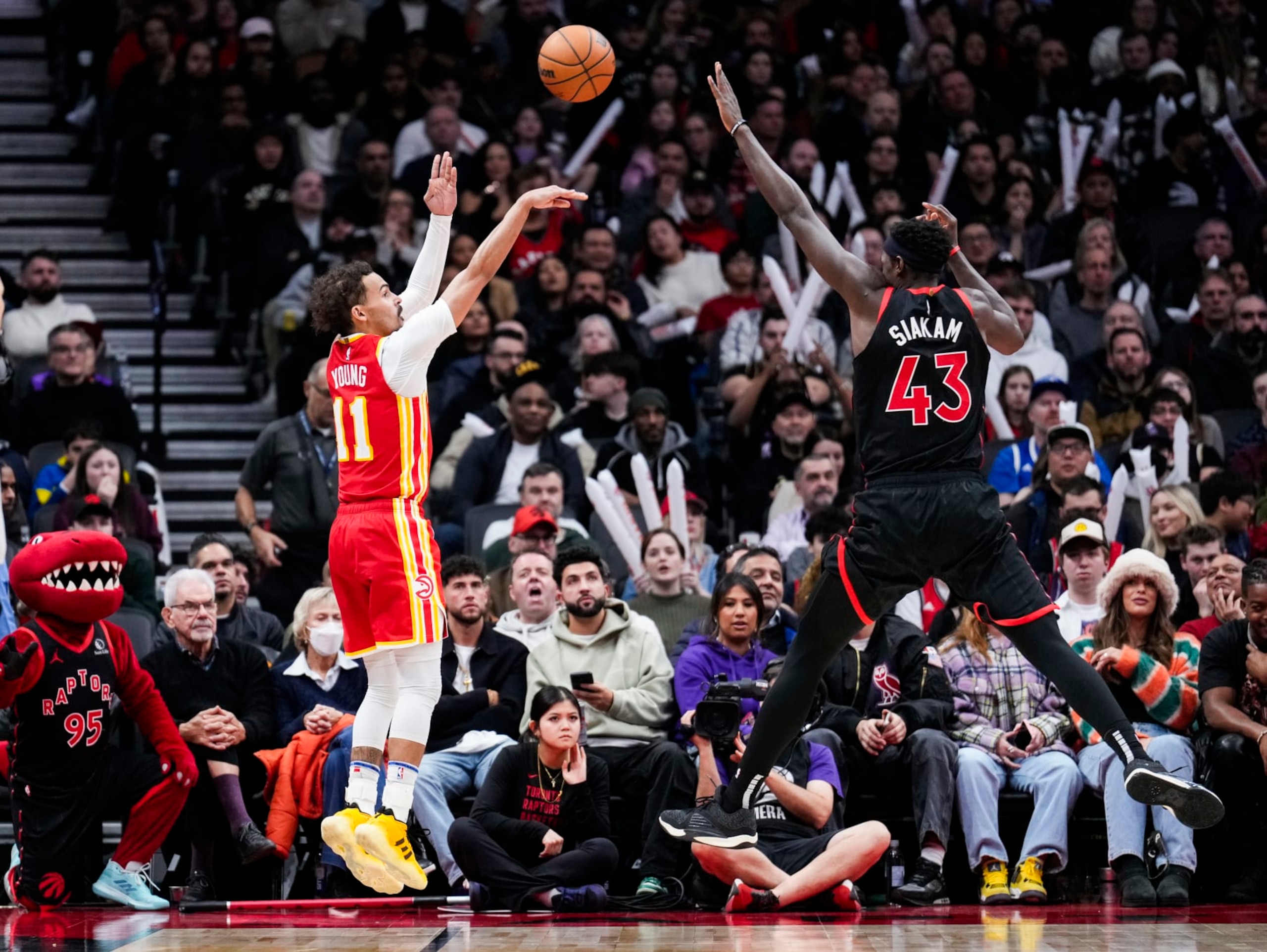 Trae Young and Pascal Siakam