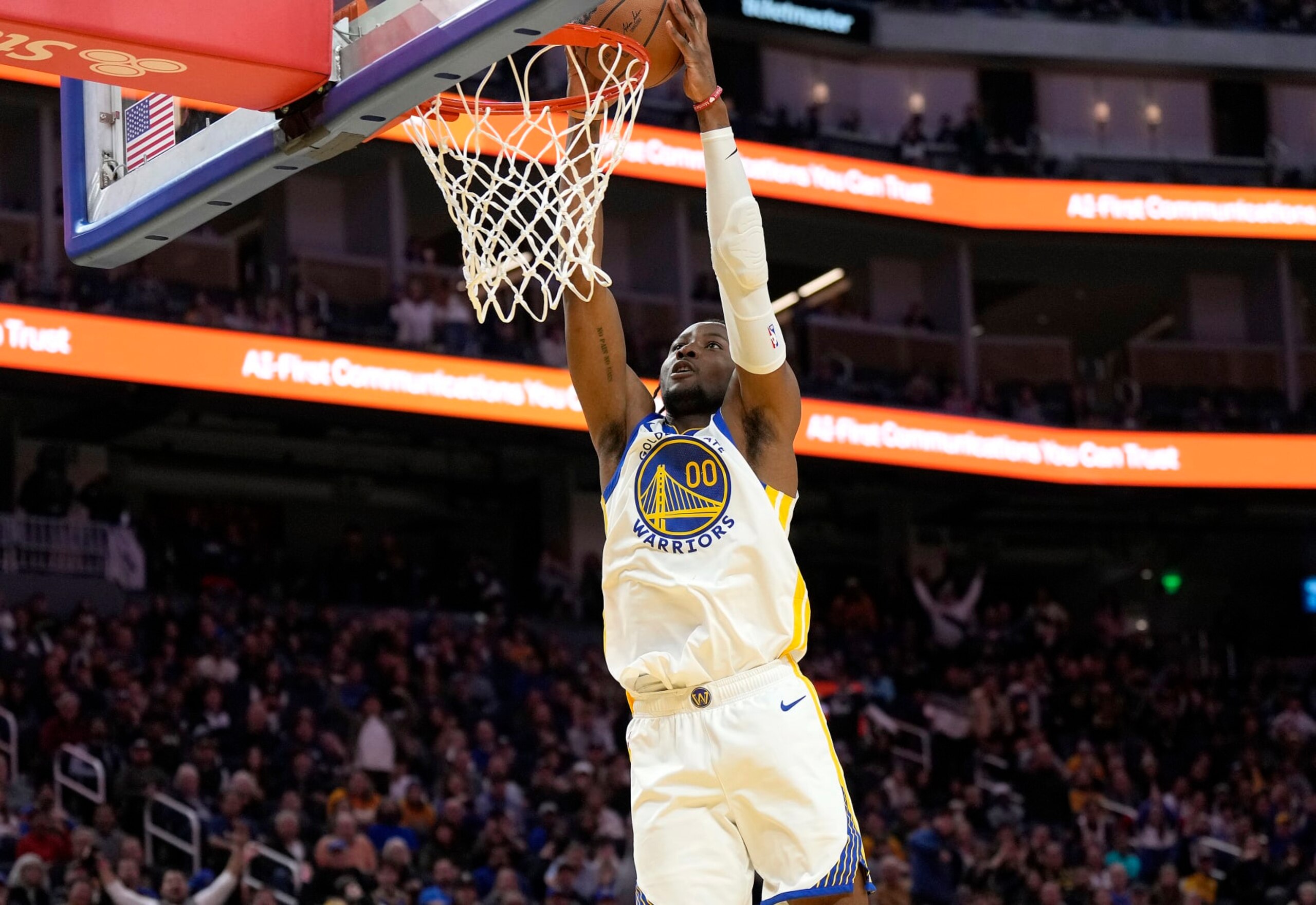 SAN FRANCISCO, CALIFORNIA - JANUARY 02: Jonathan Kuminga #00 of the Golden State Warriors slam dunks against the Orlando Magic during the fourth quarter of an NBA basketball game at Chase Center on January 02, 2024 in San Francisco, California. NOTE TO USER: User expressly acknowledges and agrees that, by downloading and or using this photograph, User is consenting to the terms and conditions of the Getty Images License Agreement. (Photo by Thearon W. Henderson/Getty Images)