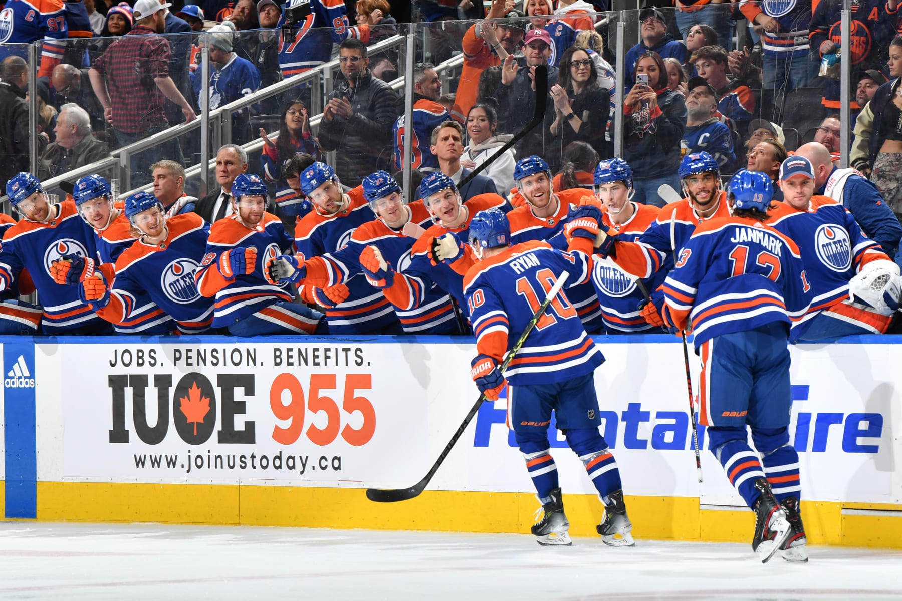 EDMONTON, CANADA - JANUARY 16: Derek Ryan #10 of the Edmonton Oilers celebrates his third period goal against the Toronto Maple Leafs with Mattias Janmark #13 at the bench at Rogers Place on January 16, 2024, in Edmonton, Alberta, Canada. (Photo by Andy Devlin/NHLI via Getty Images)