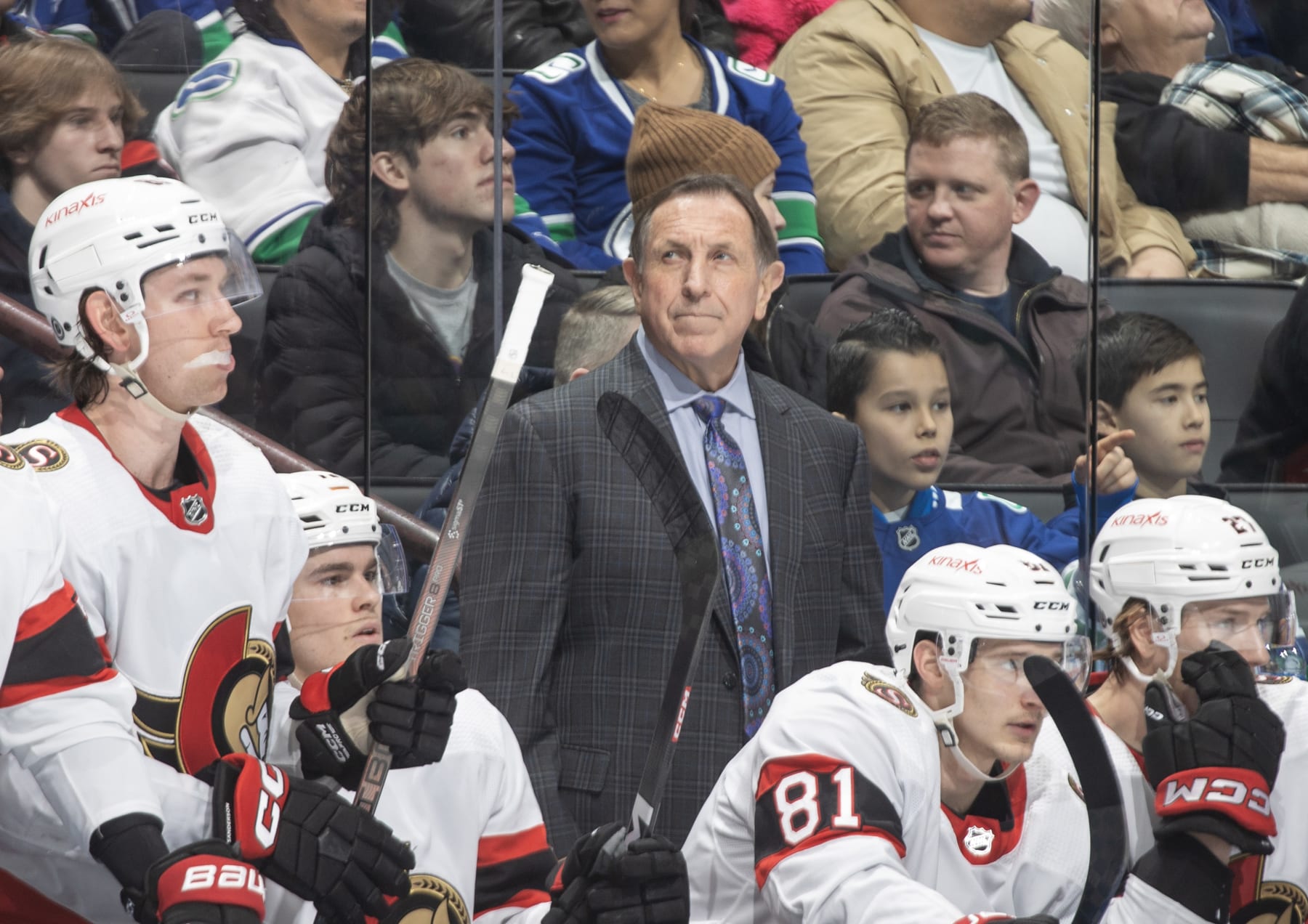 VANCOUVER, CANADA - JANUARY 02: Head coach Jacques Martin of the Ottawa Senators looks onto the ice dejected after the 4th Vancouver Canuck goal during the first period of their NHL game at Rogers Arena on January 2, 2024 in Vancouver, British Columbia, Canada.  (Photo by Jeff Vinnick/NHLI via Getty Images)