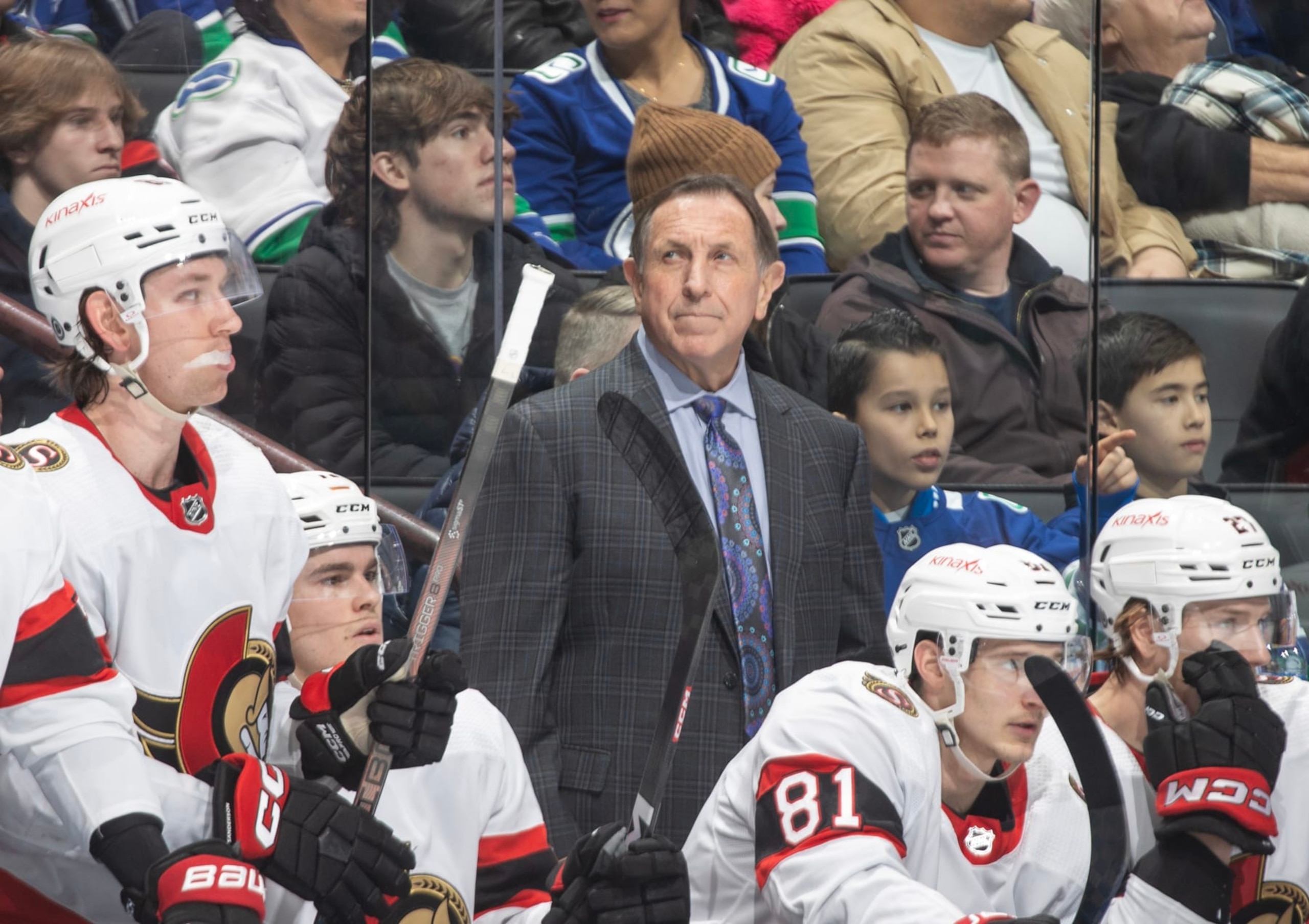 VANCOUVER, CANADA - JANUARY 02: Head coach Jacques Martin of the Ottawa Senators looks onto the ice dejected after the 4th Vancouver Canuck goal during the first period of their NHL game at Rogers Arena on January 2, 2024 in Vancouver, British Columbia, Canada.  (Photo by Jeff Vinnick/NHLI via Getty Images)