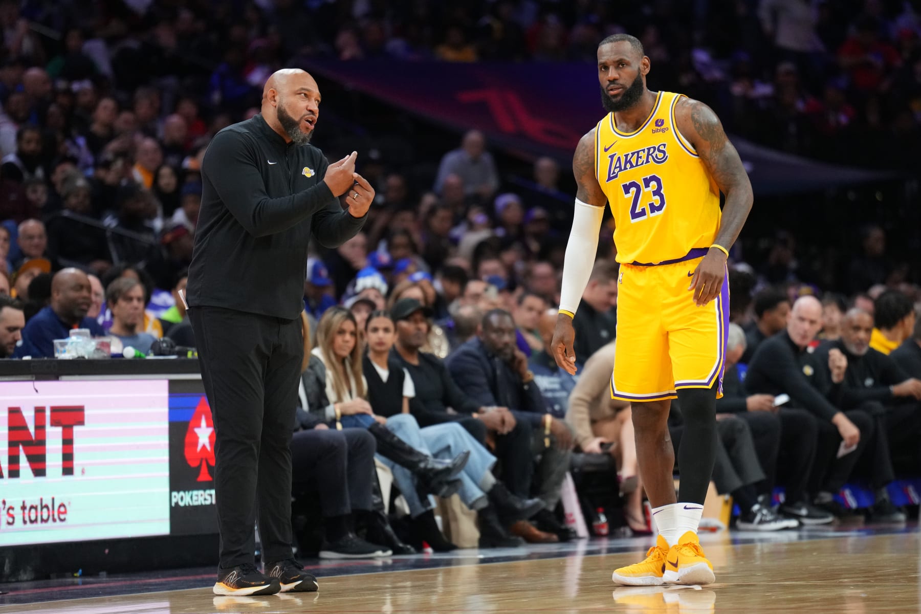 PHILADELPHIA, PA - NOVEMBER 27: LeBron James #23 and Head Coach Darvin Ham of the Los Angeles Lakers talk during the game against the Philadelphia 76ers on November 27, 2023 at the Wells Fargo Center in Philadelphia, Pennsylvania NOTE TO USER: User expressly acknowledges and agrees that, by downloading and/or using this Photograph, user is consenting to the terms and conditions of the Getty Images License Agreement. Mandatory Copyright Notice: Copyright 2023 NBAE (Photo by Jesse D. Garrabrant/NBAE via Getty Images)
